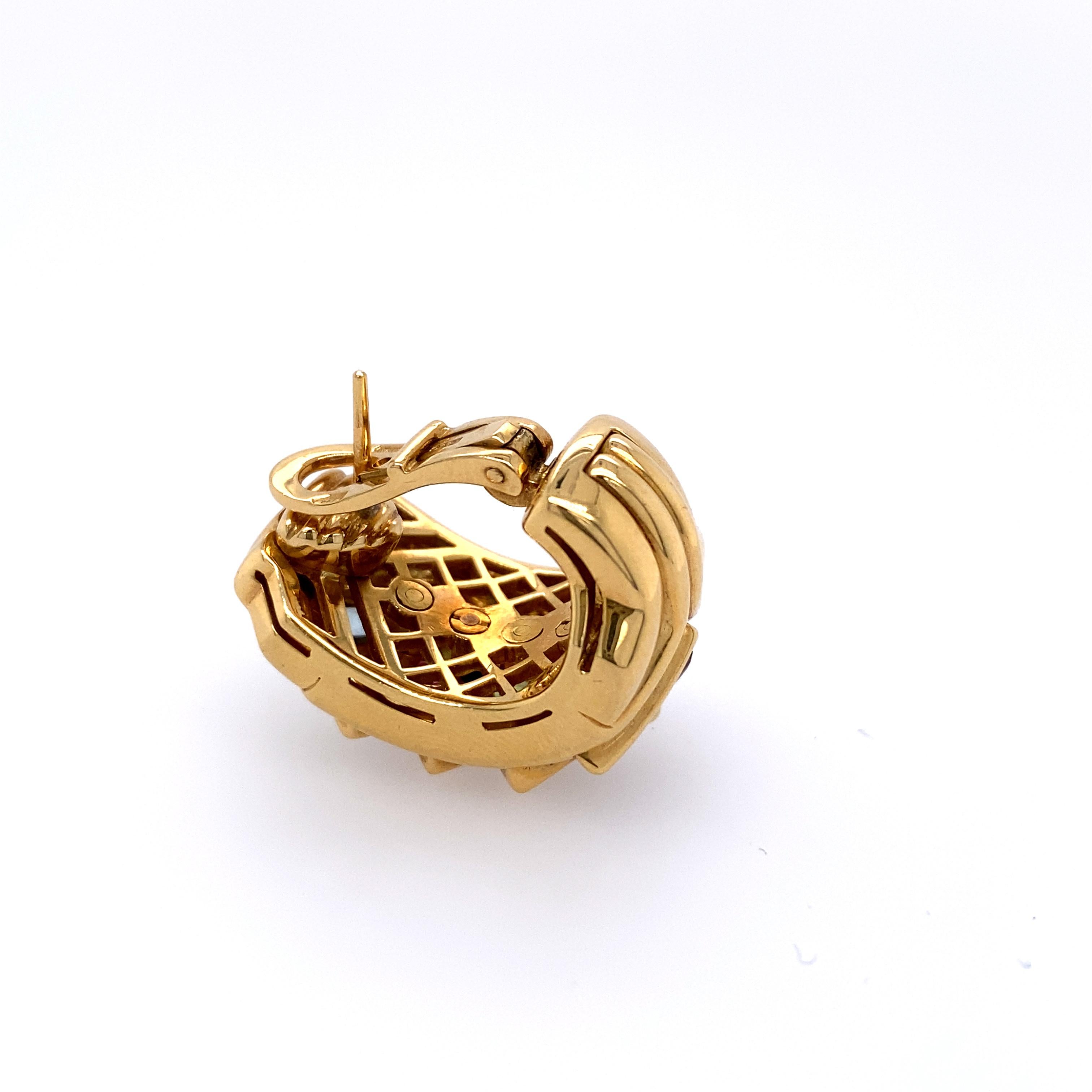 18k Gold Bvlgari earrings set in Amethyst , Peridot, Tourmaline & Aquamarine. 
Total weight 33.2 g  Measurements 13.70 mm x 23.65 mm