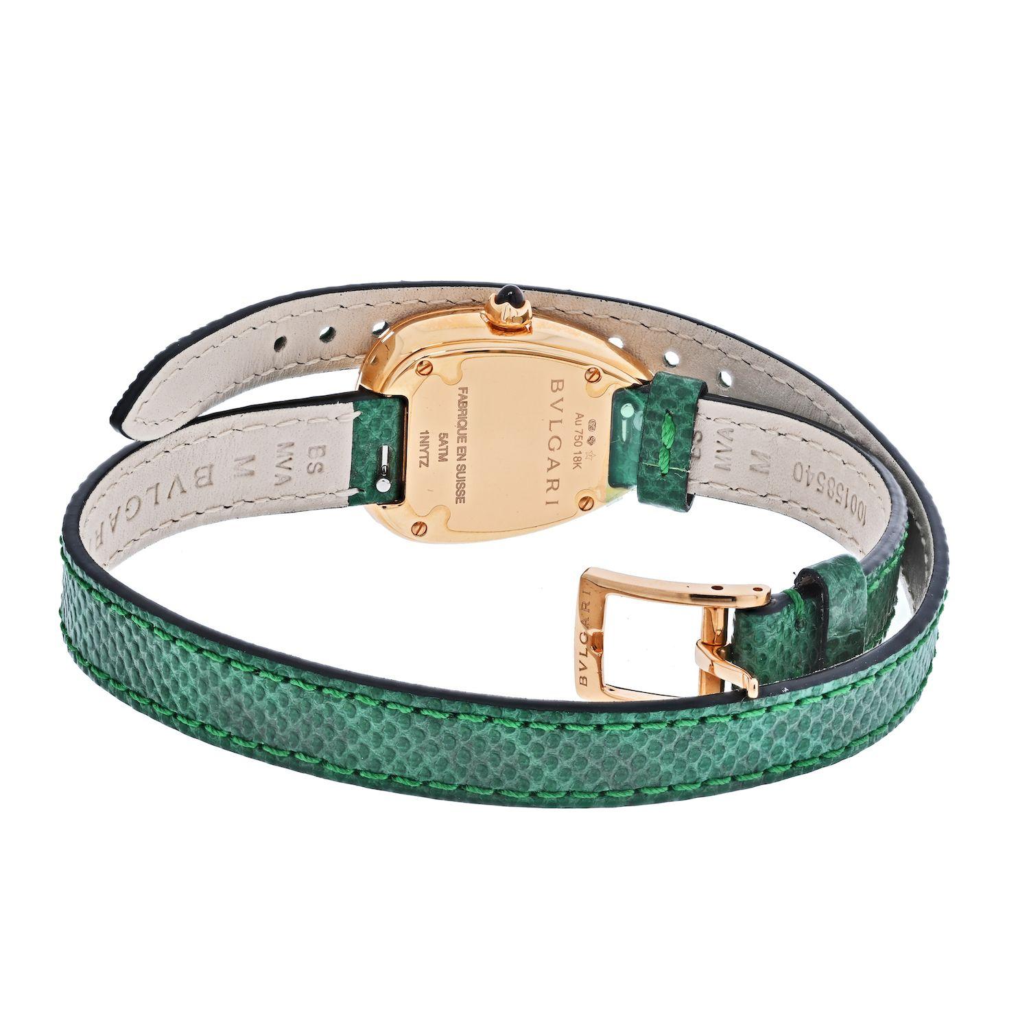 Bvlgari Serpenti ladies watch with 18k Rose Gold case and Double Spiral Green Leather strap. With box and papers. 
Watch runs on quartz movement.
Serpenti watch with quartz movement, 32 mm 18 kt rose gold curved case set with round brilliant-cut