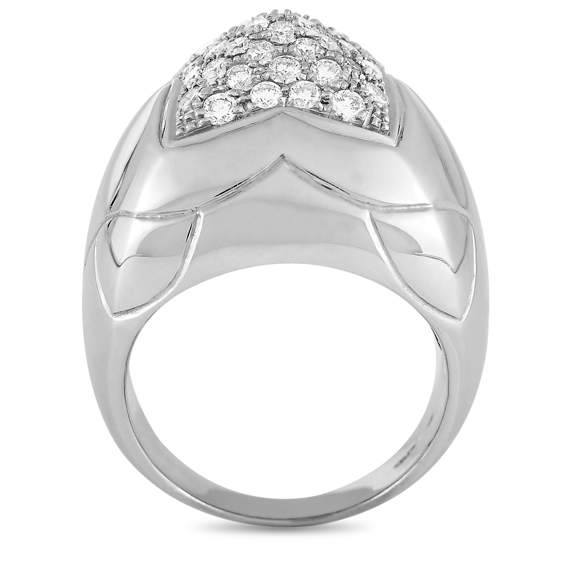 This Bvlgari ring is made of 18K white gold and weighs 15.5 grams, boasting band thickness of 4 mm and top height of 12 mm, while top dimensions measure 13 by 13 mm. The ring is embellished with diamond stones that feature F color and amount to 0.75