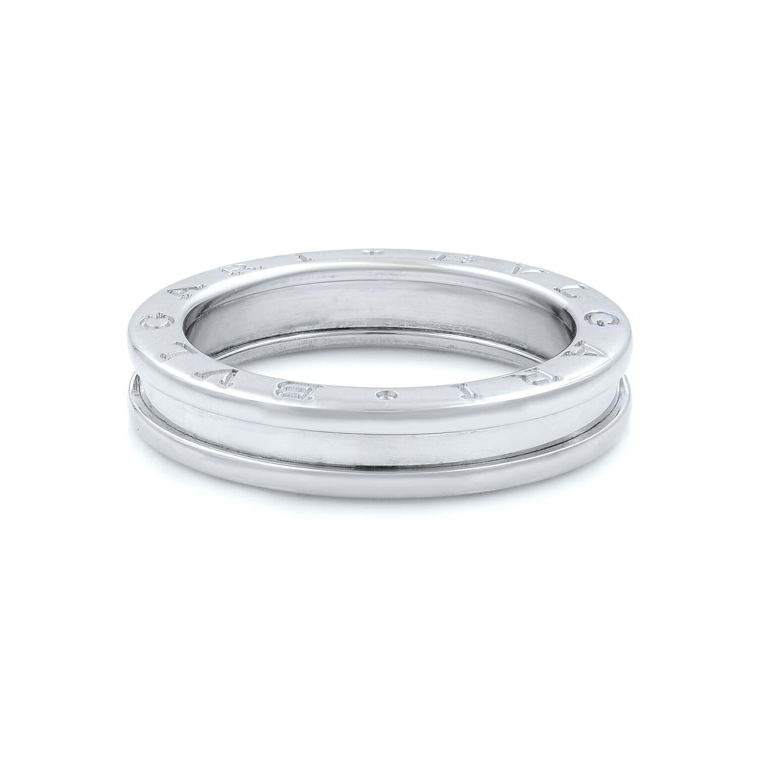 Bvlgari B.Zero 1 Band Ring. Crafted from 18k white gold with a polished finish.
Material: 18k white gold.
Hallmark: Bvlgari 750 Made in Italy 58.
Width: 4.81mm
Ring Size: 8.5
Weight: 8.06 grams.