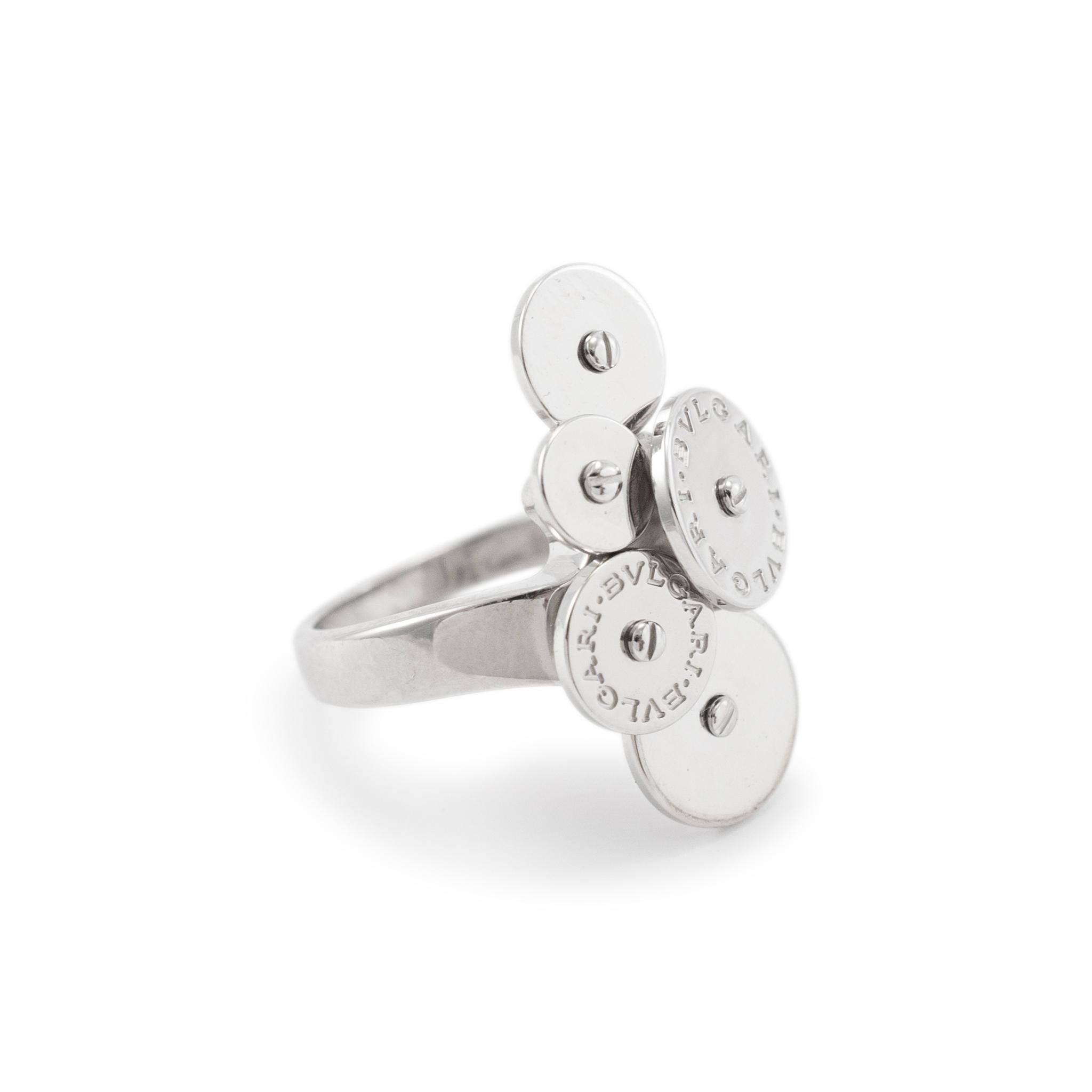 Brand: Bvlgari

Gender: Ladies

Metal Type: 18K White Gold

Size: 6

Width: 25.40mm tapering to 2.20mm

Diameter: 14.60 mm

Weight: 9.90 Grams

One ladies designer made polished rhodium plated 18K white gold, solitaire, cocktail, rolling ring with a