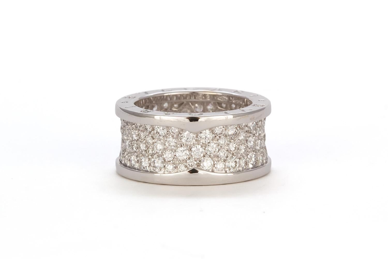 We are pleased to offer this Bvlgari 18k White Gold & Diamond B.Zero1 Ring Reference 345593. This ring is a current design offering from the Bvlgari and originally retails for $18,900. It features the classic B.Zero1 design fashioned from 18k white