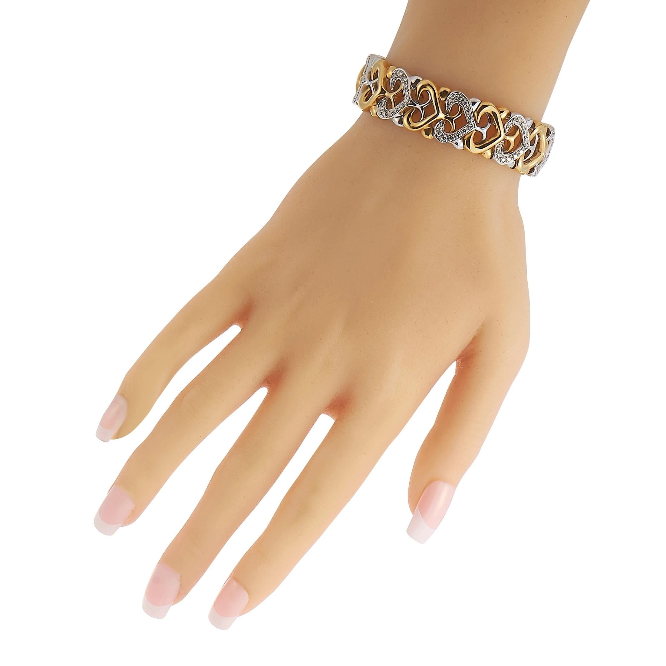 Elegant hearts crafted from 18K Yellow Gold and 18K White Gold make this Bvlgari bracelet a scintillating piece of jewelry that is inherently romantic. Covered in 1.0 carats of diamonds, this structured style measures 7” long and includes secure box