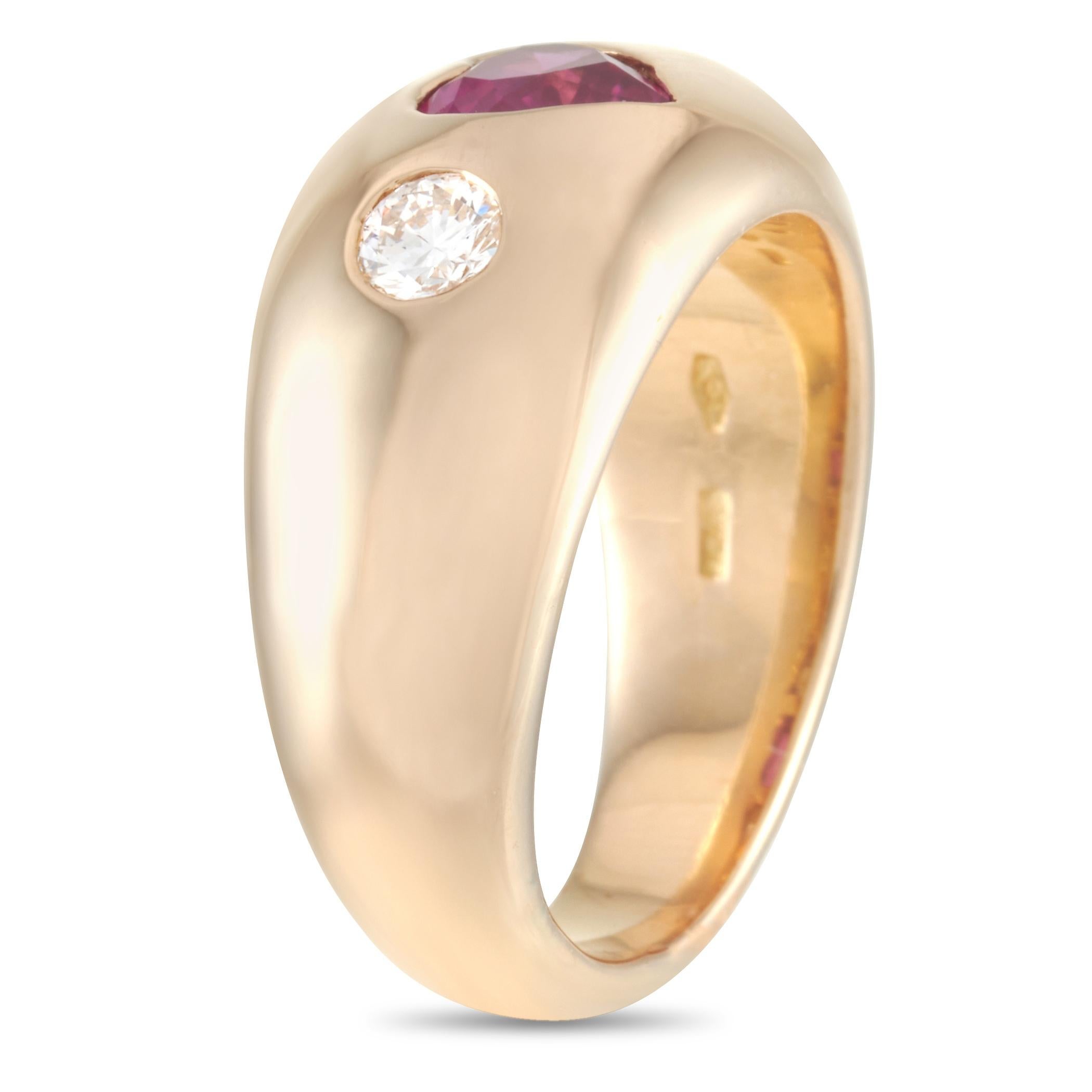 This Bvlgari ring is crafted from 18K yellow gold and set with a heart-shaped 0.85 ct ruby and with diamonds that total 0.25 carats. The ring weighs 12.1 grams. It boasts band thickness of 4 mm and top height of 3 mm, while top dimensions measure 9