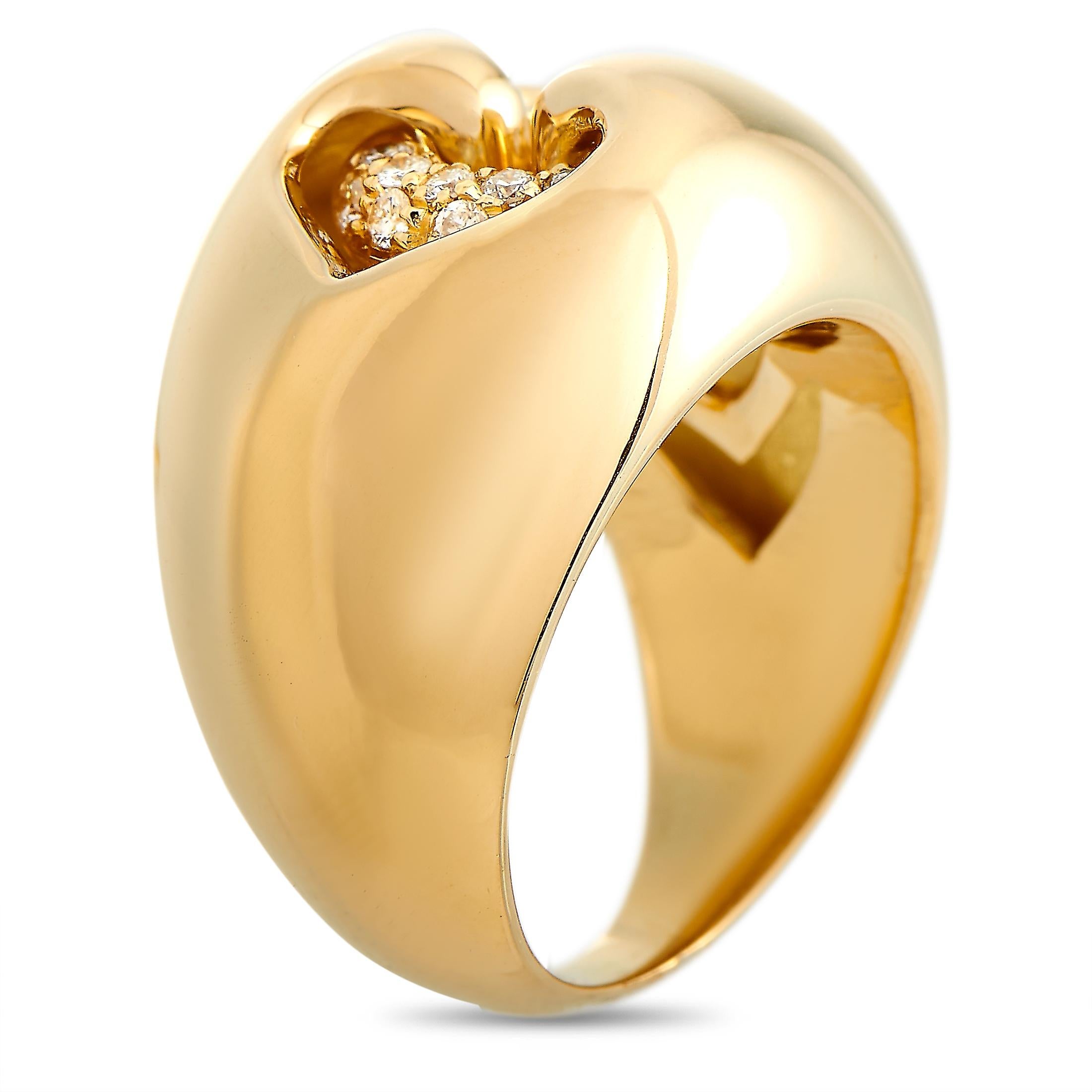 This Bvlgari ring is made of 18K yellow gold and embellished with diamonds that amount to 0.30 carats. The ring weighs 15.3 grams and boasts band thickness of 3 mm and top height of 5 mm, while top dimensions measure 15 by 20 mm.
 
 Offered in