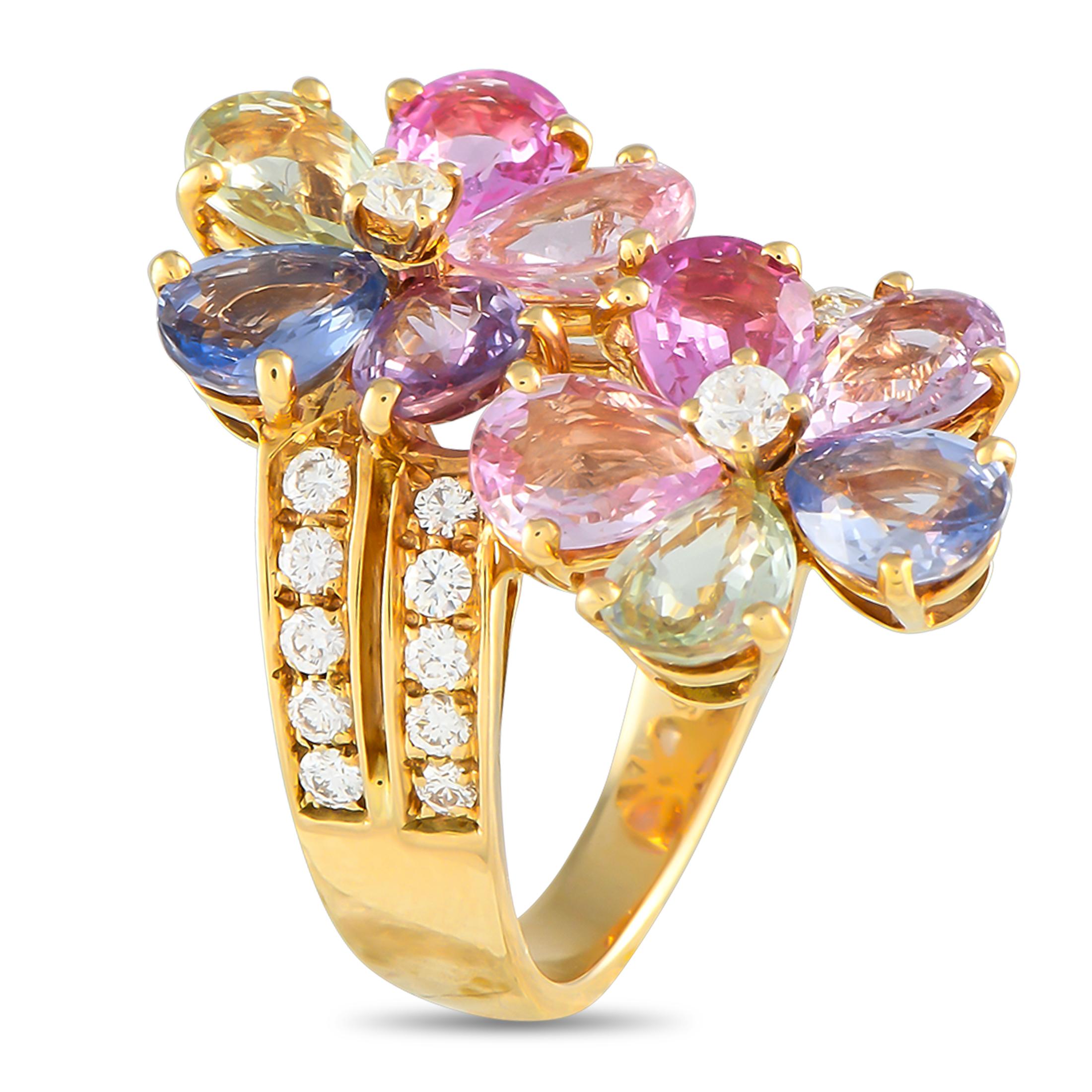 This Bvlgari ring is a celebration of color. Multicolored Sapphire gemstones totaling 8.60 carats make this floral ring instantly eye-catching. Diamond accents totaling 0.65 carats elevate the 18K Yellow Gold setting and make a statement at the