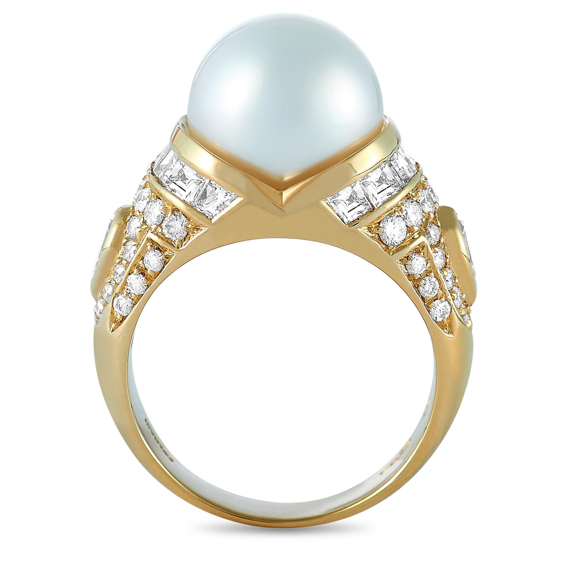 This Bvlgari ring is made of 18K yellow gold and embellished with diamonds and a pearl. The diamonds feature EF color and VS clarity and total approximately 1.25 carats. The ring weighs 10.3 grams and boasts band thickness of 3 mm and top height of