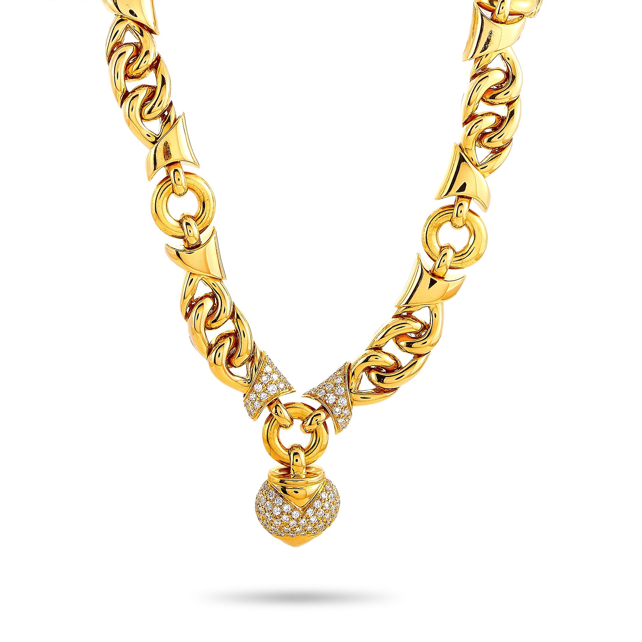 This Bvlgari necklace is crafted from 18K yellow gold and set with diamonds that feature grade F color and VVS1 clarity and amount to 1.50 carats. The necklace weighs 136.3 grams, measures 15” in length, and boasts a 1” by 0.65” pendant.
 
 Offered