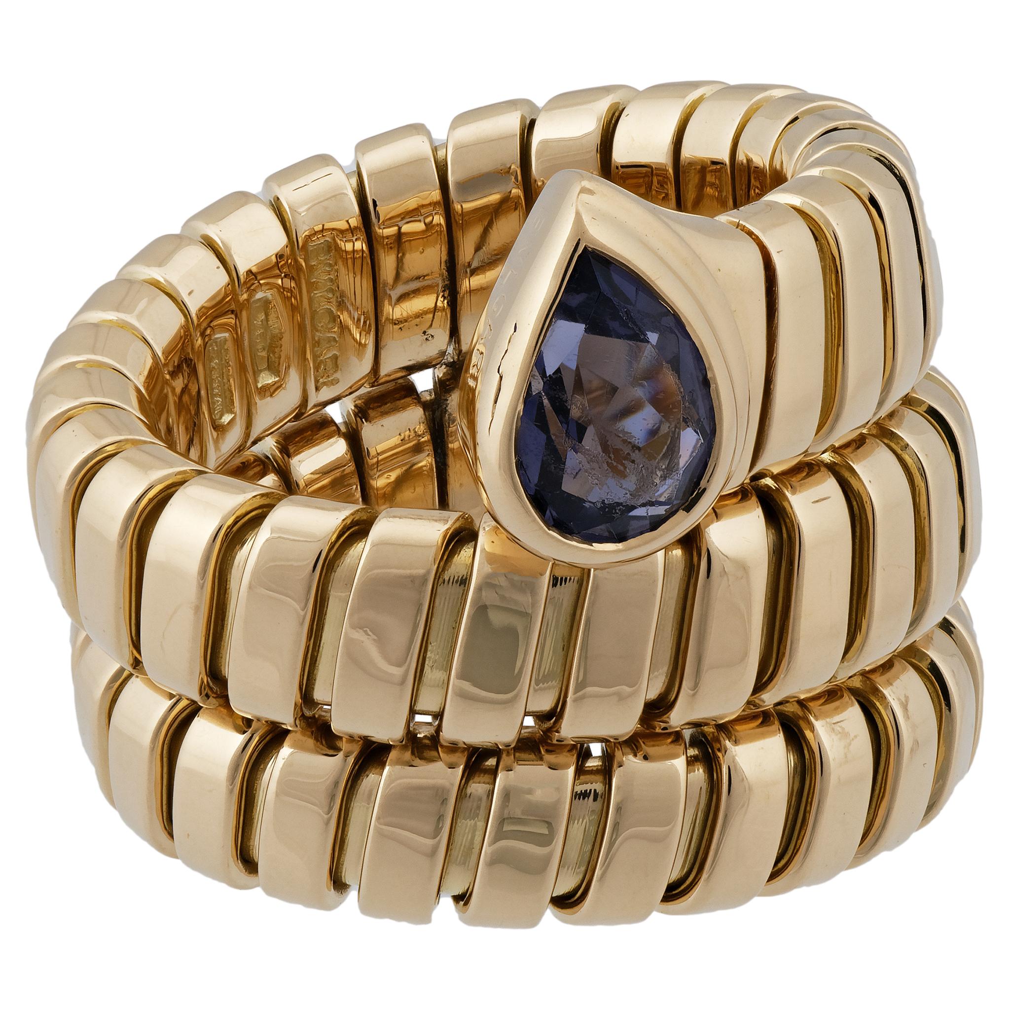 The serpentine, weaving yellow gold band is enough to make this ring a conversation starter, but the captivating, soothing and altogether rich hue of the amethyst takes it to a whole new level. Sophisticated and chic.

METAL TYPE: 18K Yellow
