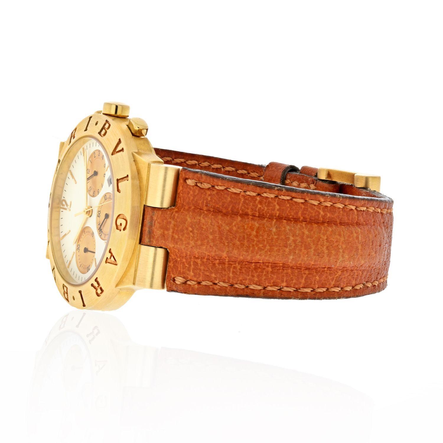 Bulgari (Bvlgari) Diagono 18k Yellow Gold Chronograph CH 35 G (CH35G) - Quartz movement. 18k yellow gold case (35mm diameter). White dial with gold subdials; date between 4 & 5 o'clock. Brown tan strap band with 18k yellow gold buckle. Pre-owned