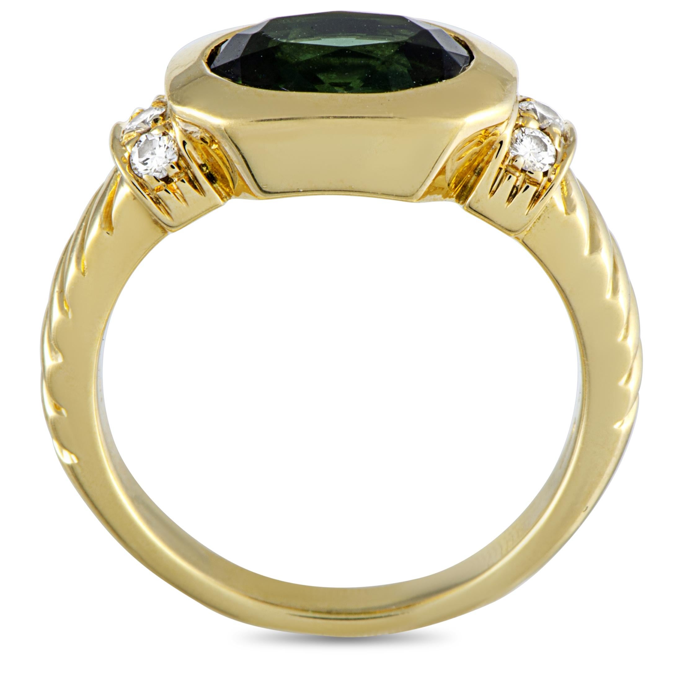 This Bvlgari ring is crafted from 18K yellow gold and set with diamonds and a tourmaline. The ring weighs 6.4 grams, boasting band thickness of 4 mm and top height of 6 mm, while top dimensions measure 15 by 9 mm.
 
 Offered in estate condition,