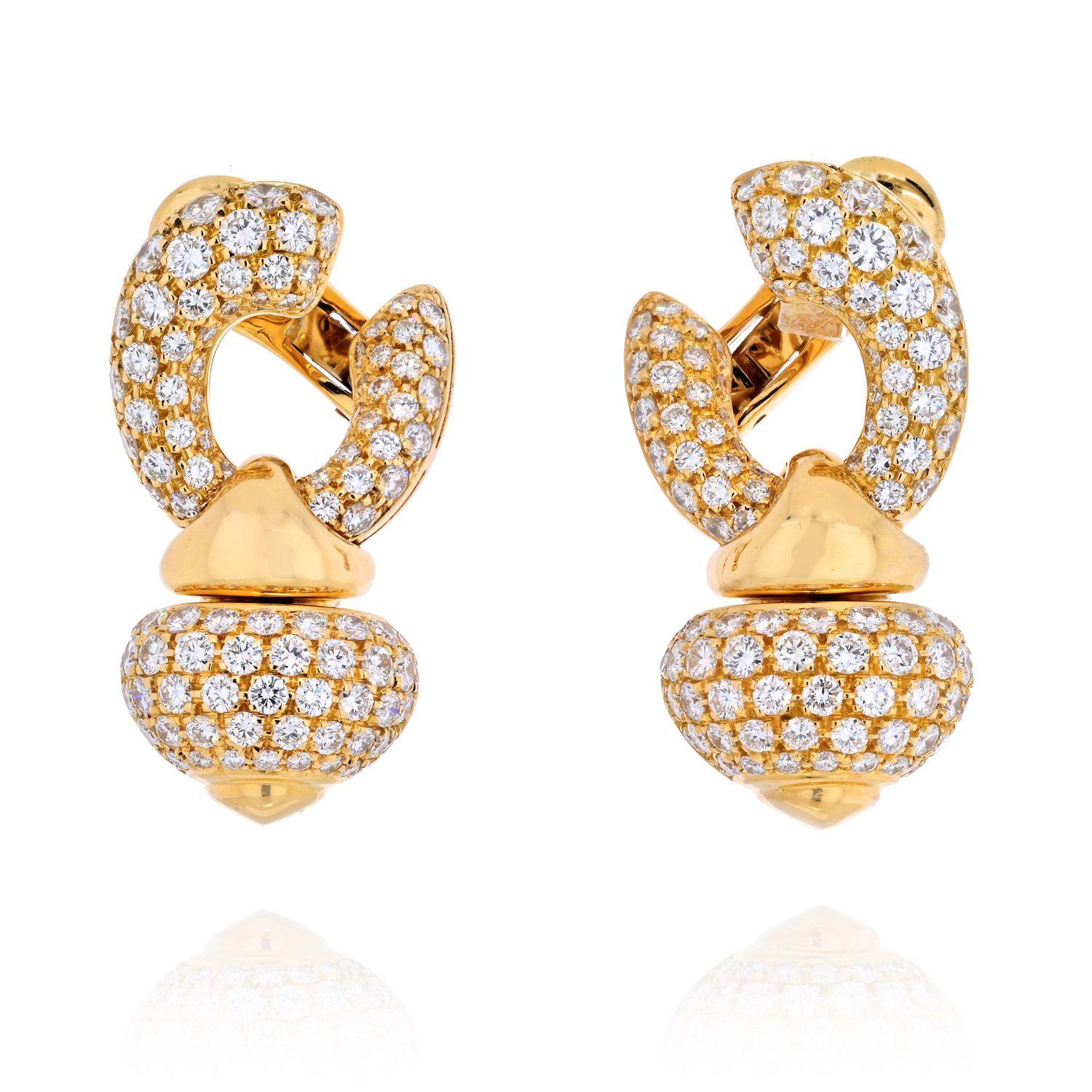 Beautiful and chunky these Bvlgari diamond earrings frm the Chandra collection are sure to delight. Crafted in 18K Yellow Gold with the solid and bold look and feel this pair of earrings is a true Bvlgari classic. Encrusted with round cut diamonds,