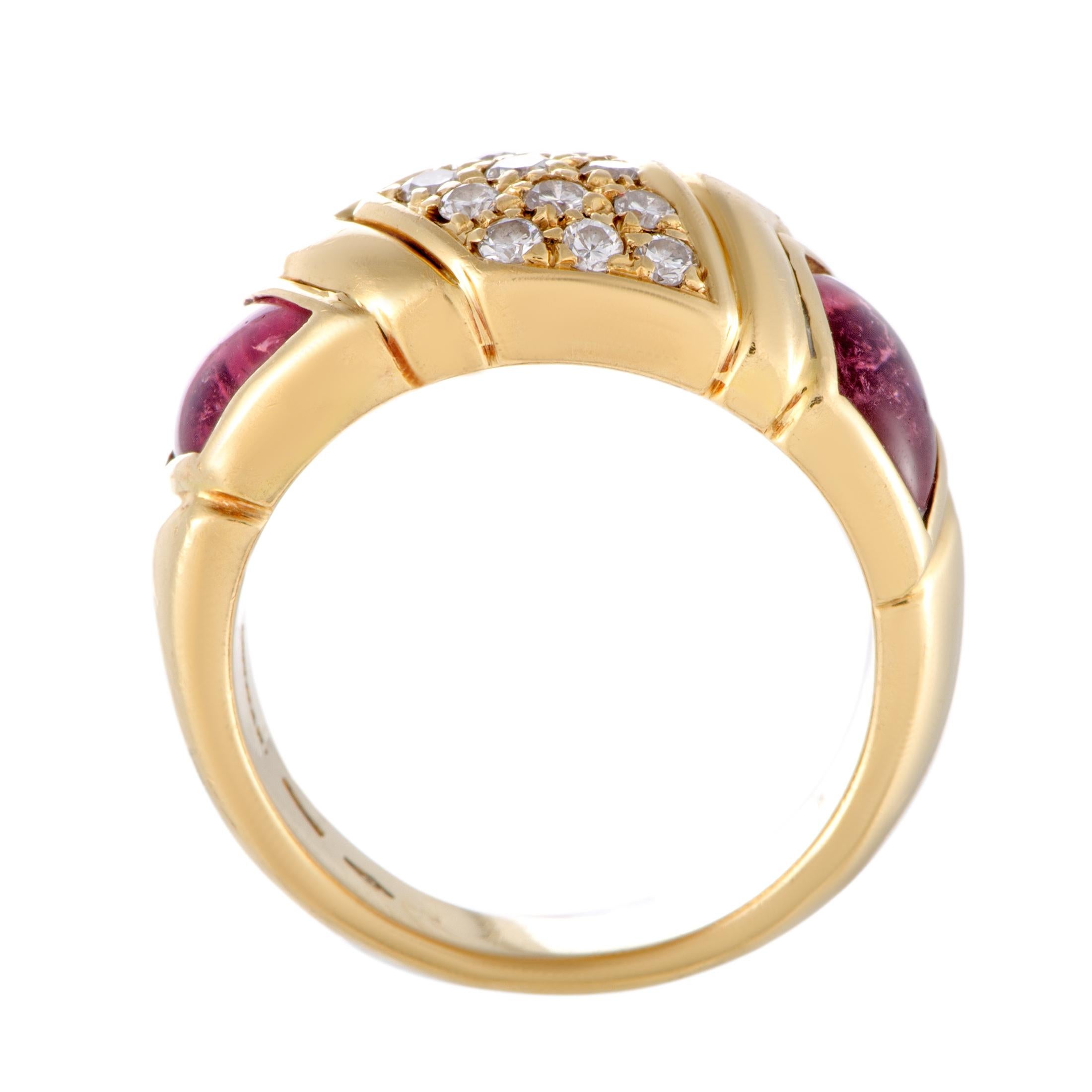 Add a splendidly feminine touch to your looks with this wonderful jewelry piece from Bvlgari that is beautifully crafted from radiant 18K yellow gold and attractively embellished with eye-catching gems. The ring is set with two gorgeous pink