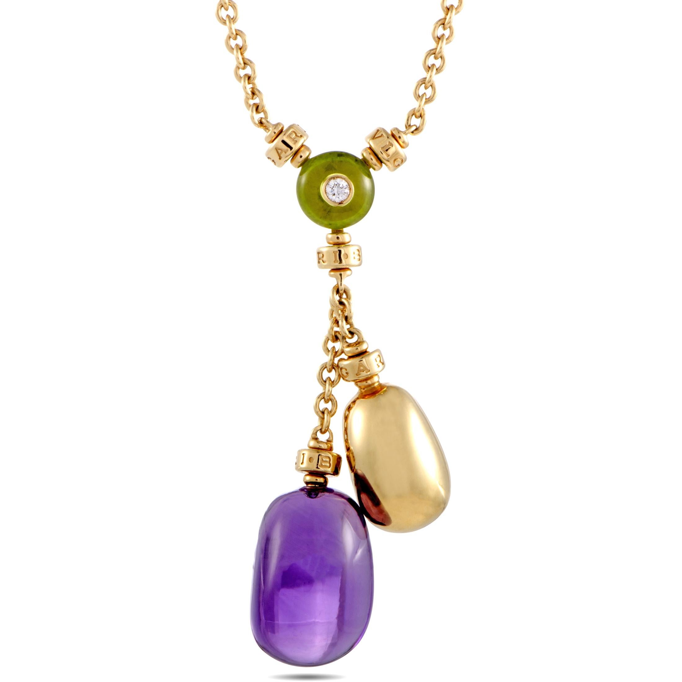 Add an attractive colorful touch to your ensembles with this gorgeous Bvlgari necklace that compels with its elegant design and eye-catching décor. The necklace is wonderfully made of 18K yellow gold and it is embellished with enticing gems.
