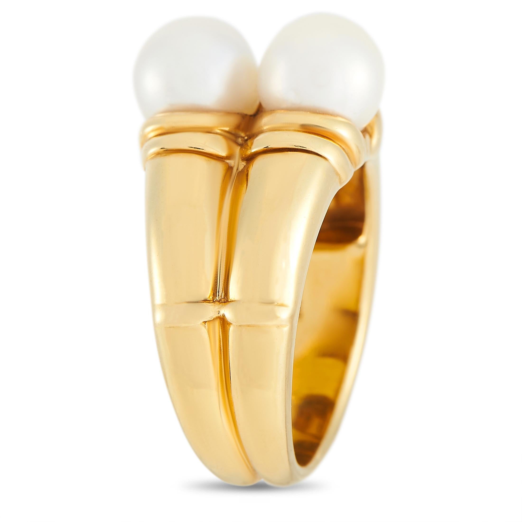 A chic, double-layered design makes this opulent Bvlgari ring anything but ordinary. The breathtaking band is crafted from 18K yellow gold and measures 5mm wide. At the center, a pair of twin pearls give this stylish piece its impressive 7mm top