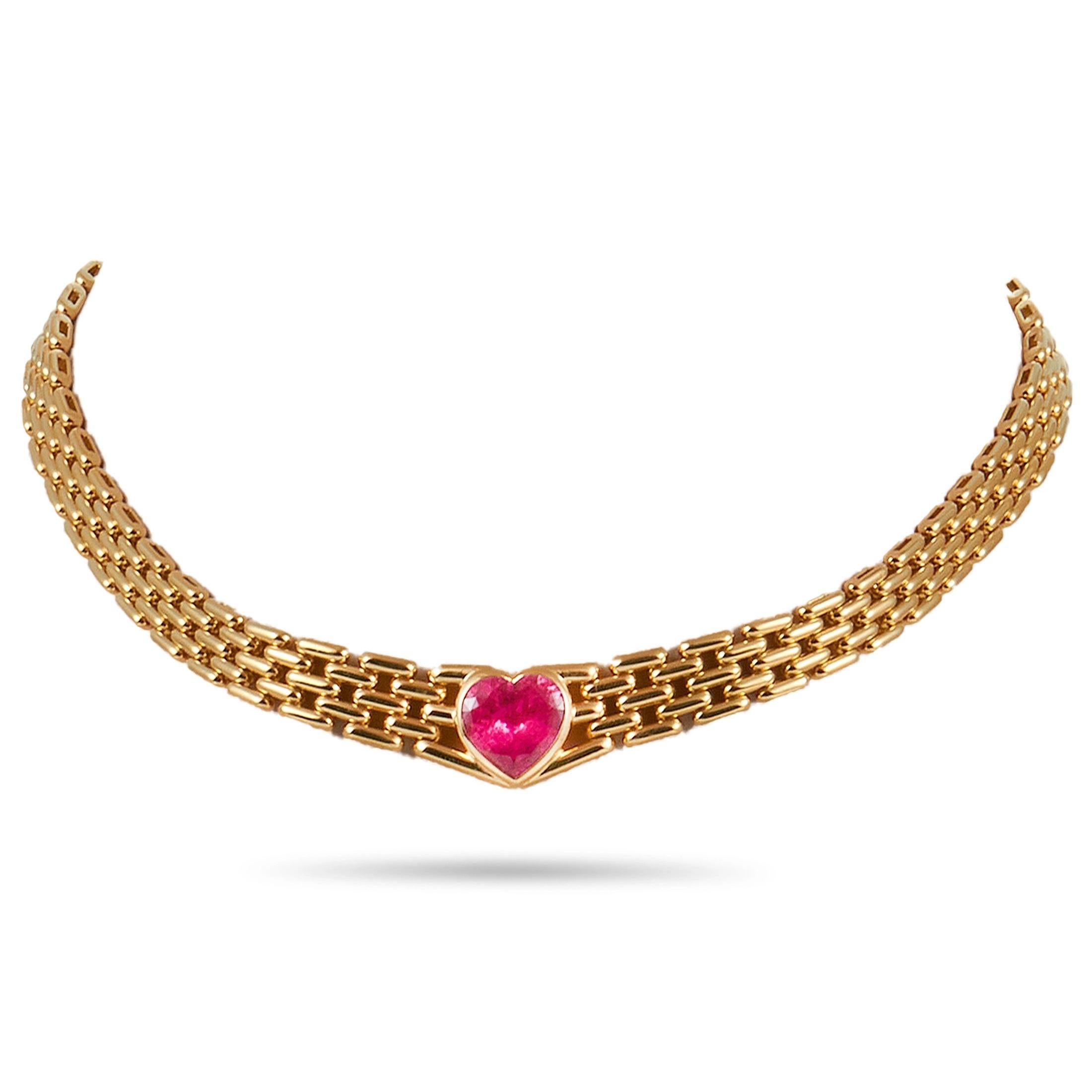 This Bvlgari necklace is made of 18K yellow gold and embellished with a rubellite. The necklace weighs 95 grams and measures 14” in length.
 
 Offered in estate condition, this jewelry piece includes the manufacturer’s box.