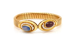 Bvlgari 18 Karat Yellow Gold Ruby Sapphire and Diamond Tubogas Wrap Bracelet