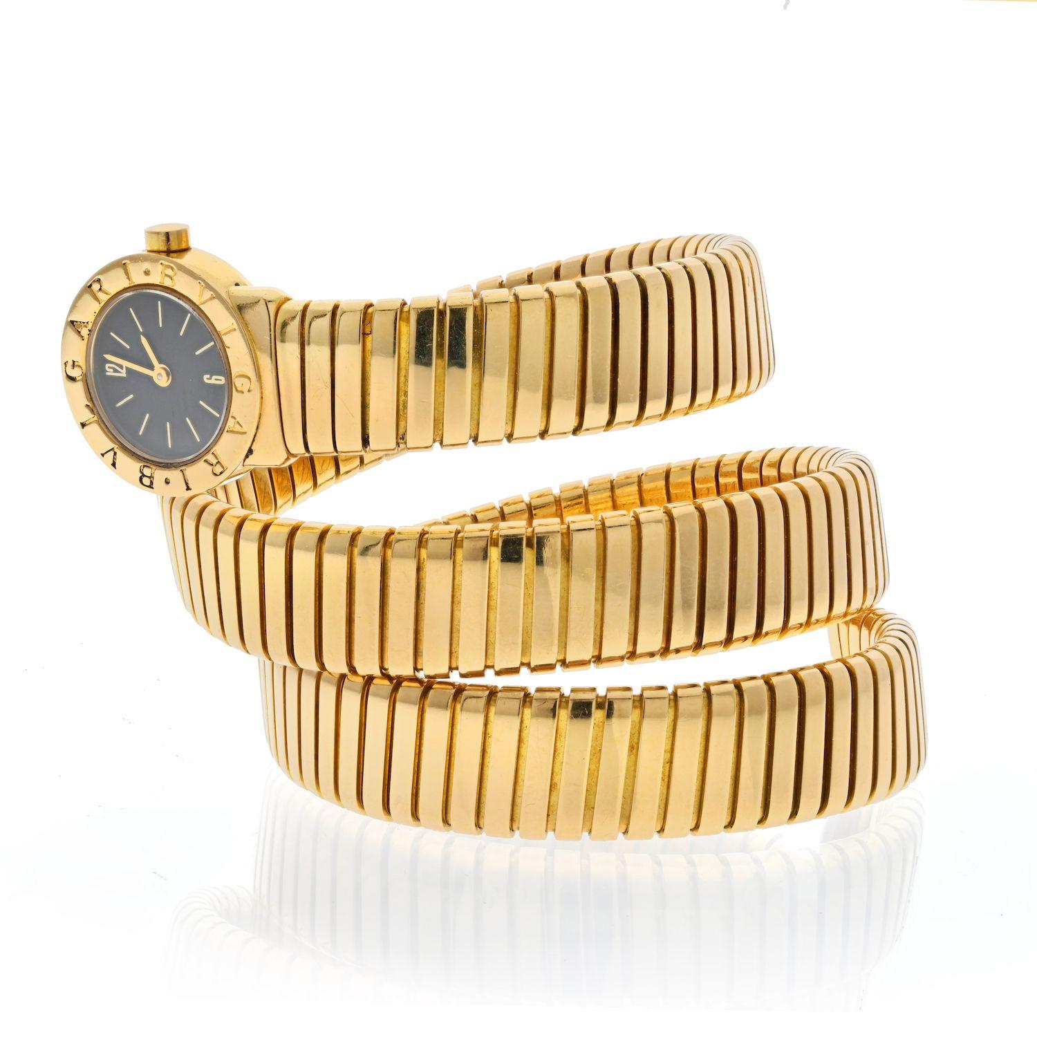 Bvlgari 18K Yellow Gold Serpenti Vintage BB19 Watch.
Bulgari’s Tubogas Snake watch is internationally recognizable classic, immaculately crafted from 18K yellow gold, this rare vintage timepiece features a black lacquered dial set in a 19mm frame