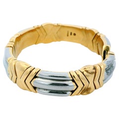 Manchette Bvlgari en or jaune 18k et acier Arrows