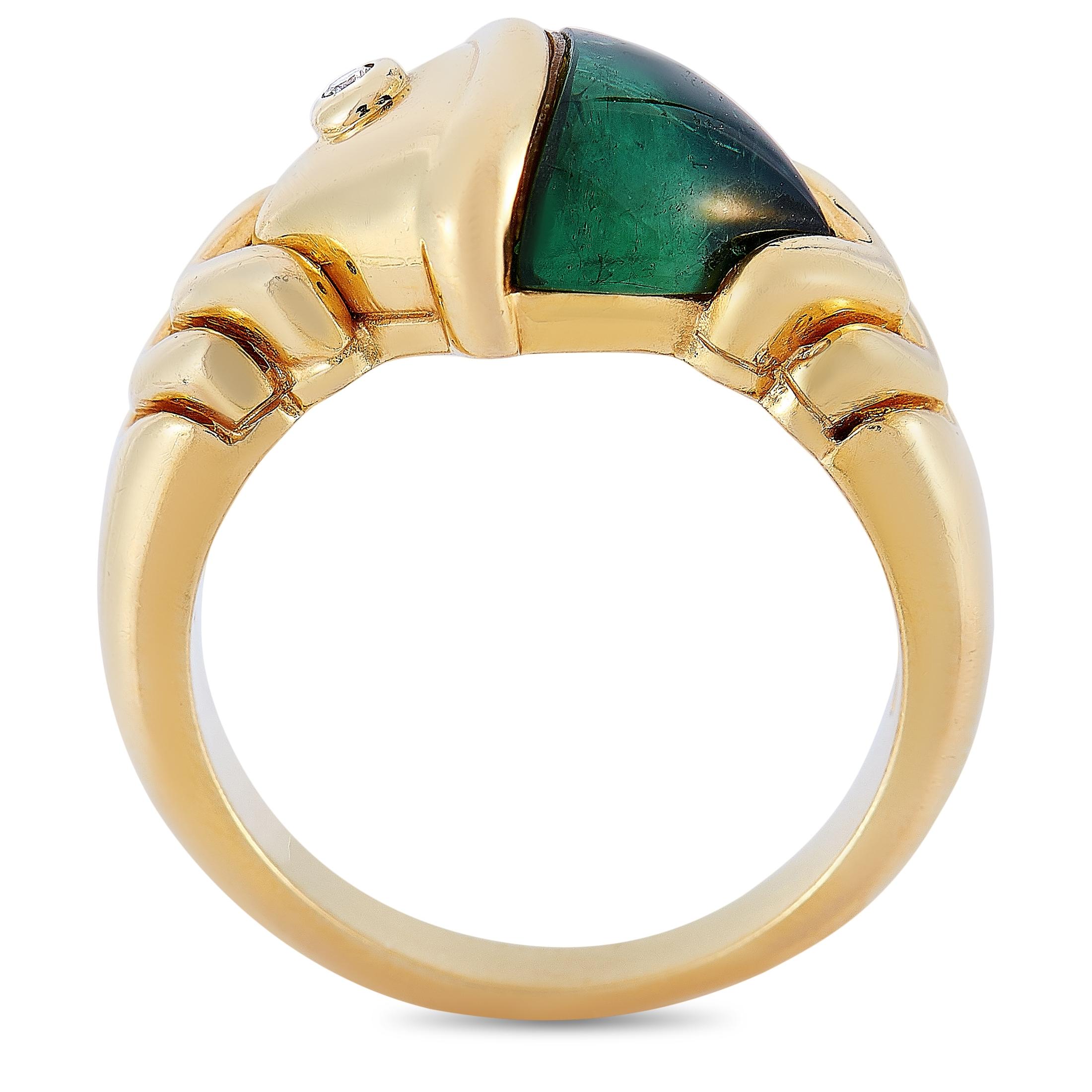 This Bvlgari ring is crafted from 18K yellow gold and embellished with a tourmaline. The ring weighs 8.8 grams and boasts band thickness of 3 mm and top height of 5 mm, while top dimensions measure 13 by 9 mm.
 
 Offered in estate condition, this