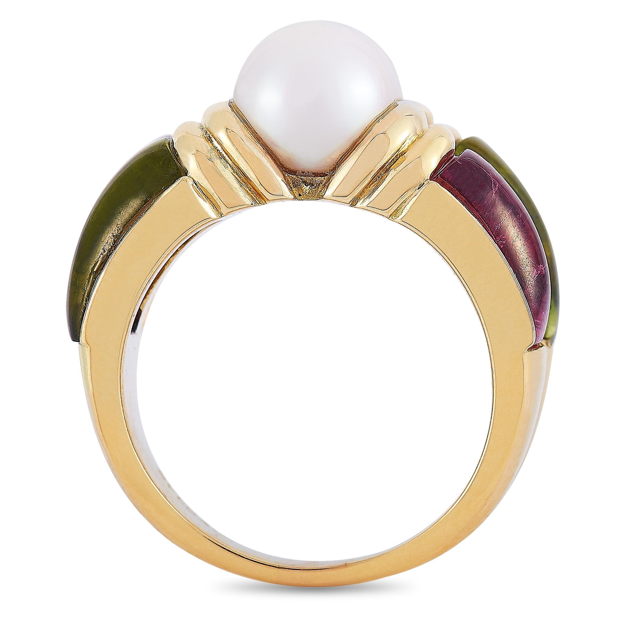 This Bvlgari ring is crafted from 18K yellow gold and weighs 12.8 grams. It boasts band thickness of 3 mm and top height of 7 mm, while top dimensions measure 20 by 13 mm. The ring is set with tourmalines, peridots and pearls.
 
 This item is