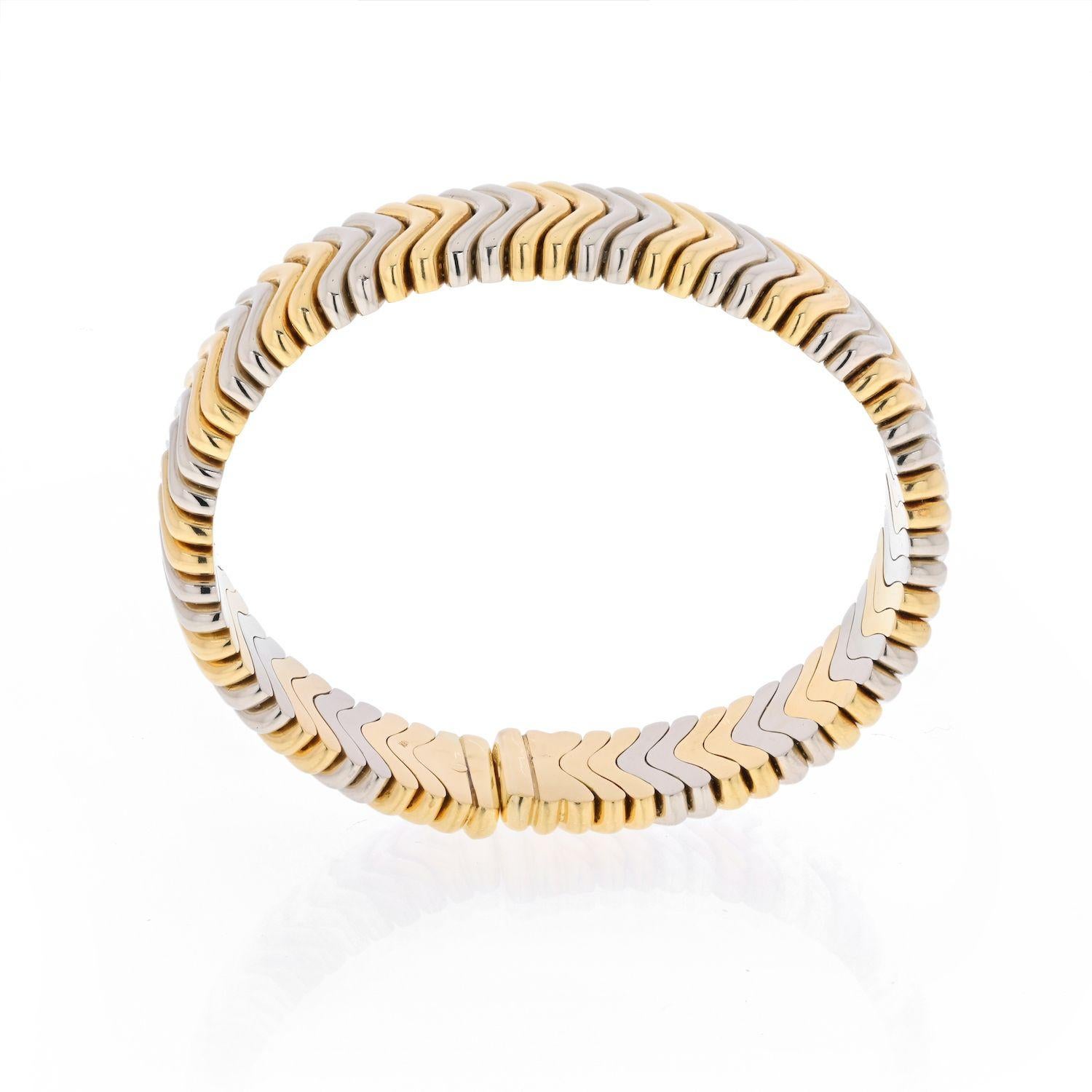 18K Tri color Bulgari tubogas bracelet in 18K rose, yellow and white gold.
Wrist size 6.25 inches. Flexible cuff. 