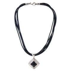 Bvlgari 18kt. White Gold Necklace with Leather Strap and Onyx Pendant