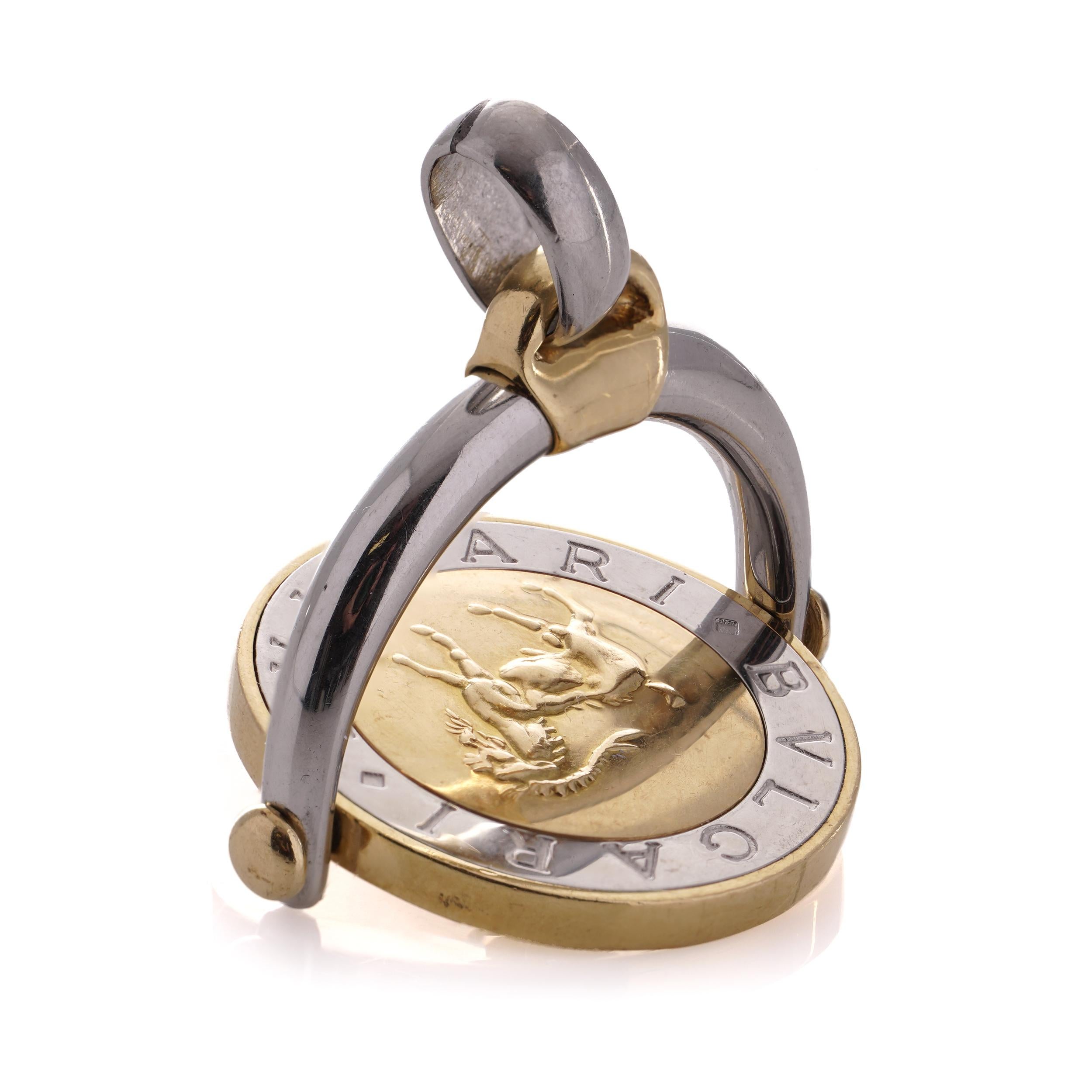 Bvlgari 18kt. yellow gold and steel Capricorn Zodiac sign flip medallion pendant.

Crafted in 18 yellow gold, this pendant beautifully showcases the Capricorn zodiac sign. The pendant is skillfully hinged, allowing for a 360-degree