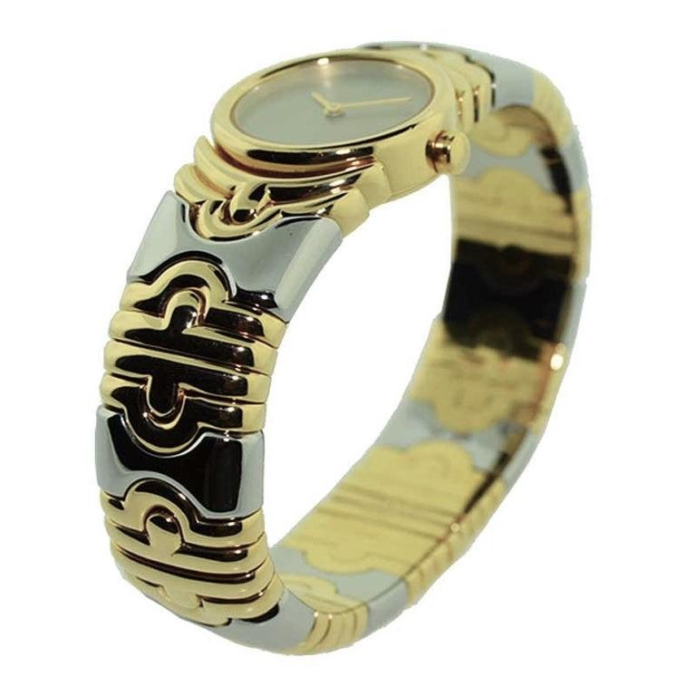 Bvlgari 18Kt. Yellow Gold and Steel Parentesi Bangle Bracelet in New Condition In Excellent Condition In Long Beach, CA