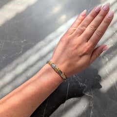 Bracelet vintage Alveare de Bvlgari des années 1970, en or jaune 18 carats et acier inoxydable