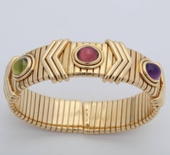 Bvlgari 1970s Cabochon Pink Tourmaline, Peridot and Amethyst Gold Cuff Bracelet