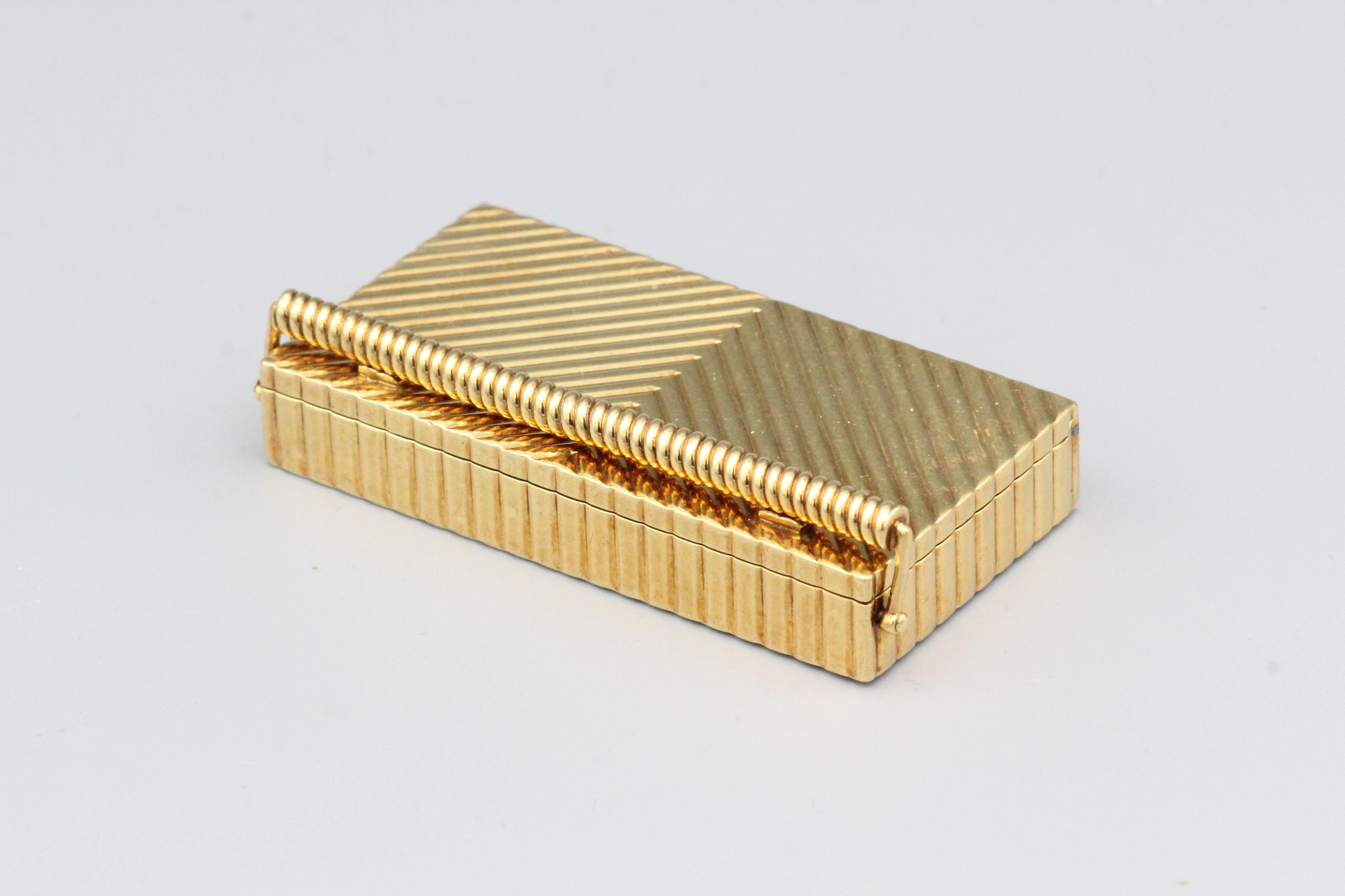 Fine 2 section 18k yellow gold pill box, by Bulgari circa 1950s.

This Bulgari geometric design pill box is a rare and exquisite piece of vintage jewelry. This pill box is crafted from high-quality 18k yellow gold, giving it a luxurious and