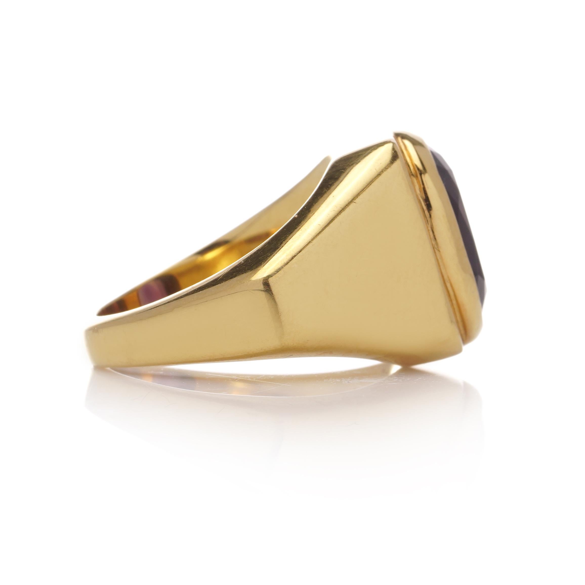 Women's or Men's Bvlgari 22kt. yellow gold geometric band ring set with an oval-cut amethyst For Sale