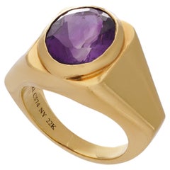 Vintage Bvlgari 22kt. yellow gold geometric band ring set with an oval-cut amethyst