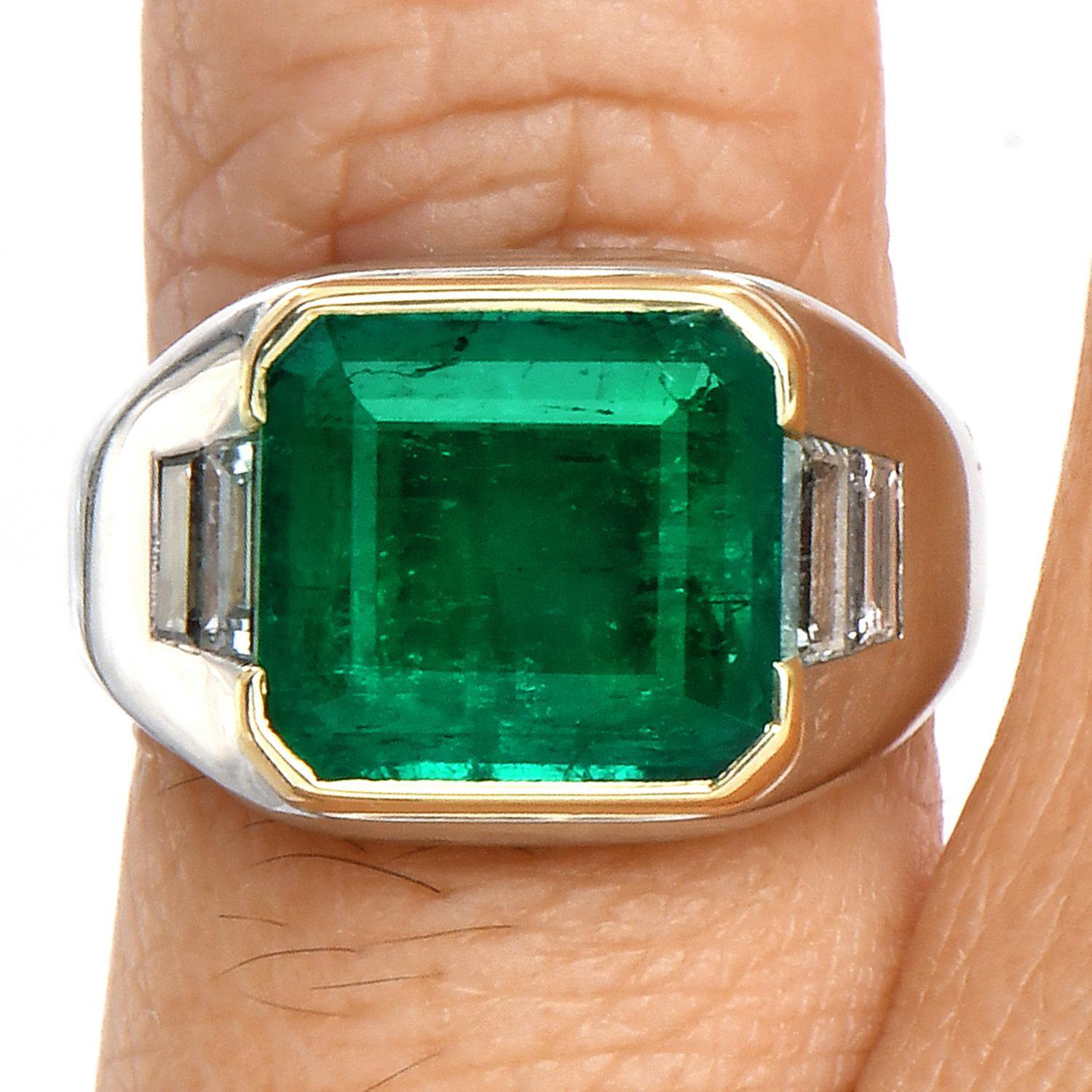 Rare Bvlgari emerald ring, which can be the perfect pinky ring for a gentleman or the modern cocktail ring for a lady.

This Exquisite Bvlgari Ring is crafted in luxurious Platinum,

topped with an 18K Yellow gold bezel for the emerald.

Centered