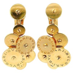 BVLGARI  Orecchini a 7 dischi in oro giallo 18 carati con ciclamino