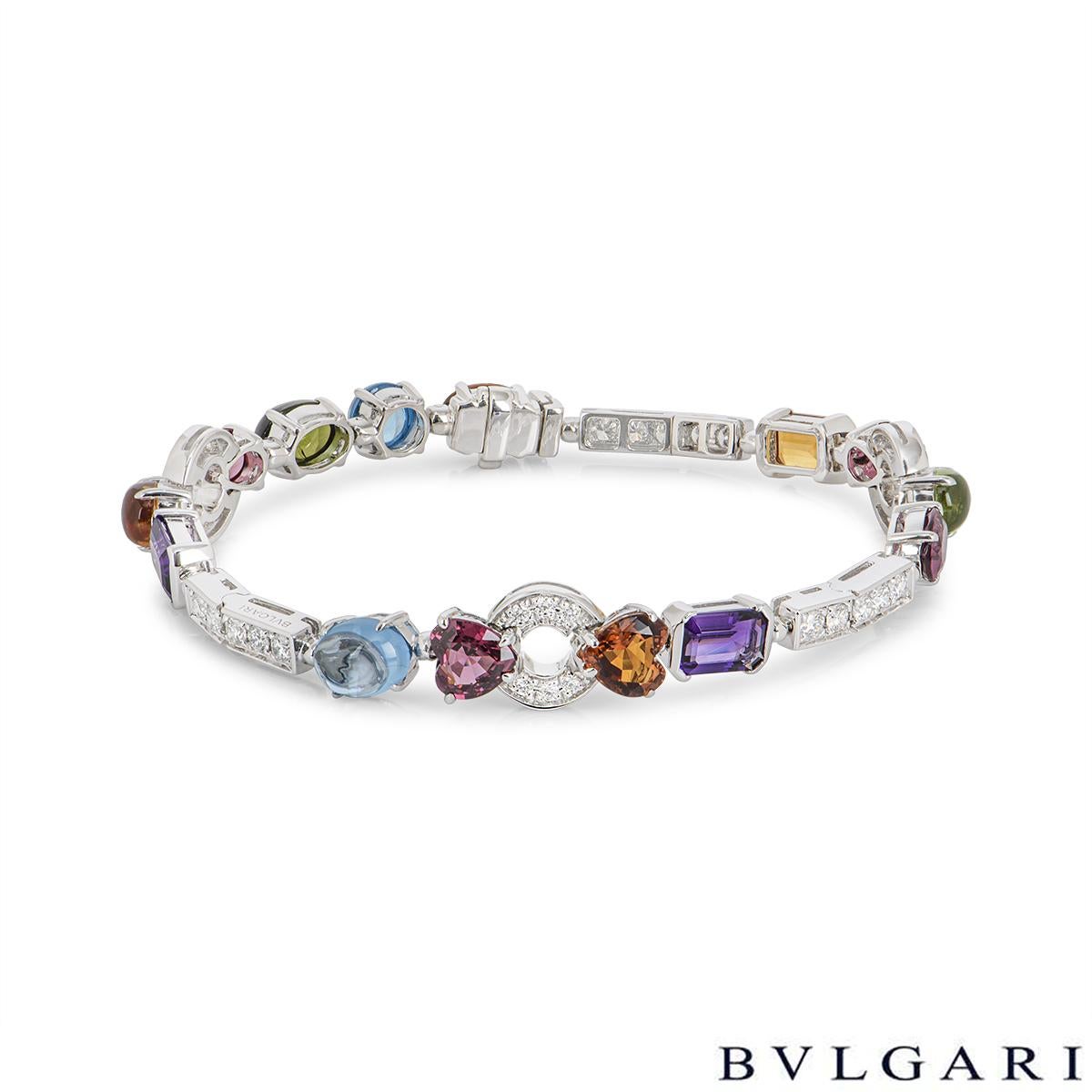 A stunning 18k white gold multi gemstone set Bvlgari bracelet from the Allegra collection. The bracelet is composed of various gemstones of different cuts including, green tourmalines, peridots, amethysts, rhodolite garnets, palmeira citrines, blue