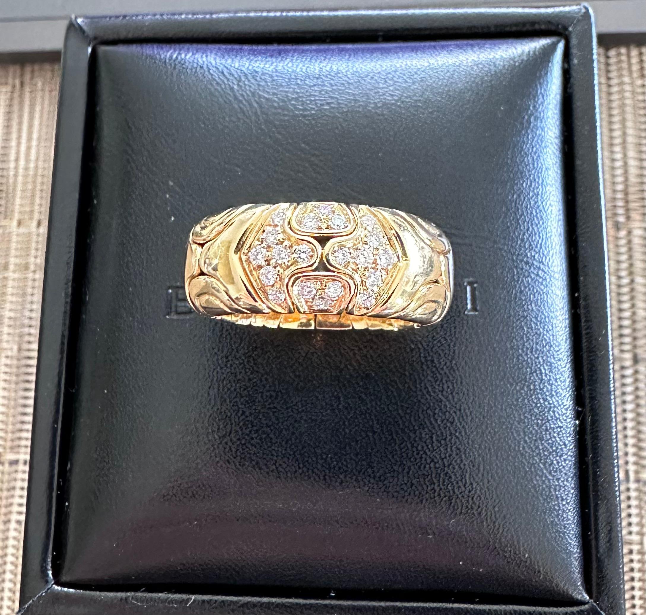 Bvlgari Diamond Band
A geometric flexible Diamond band ring crafted in Rome, Italy by the House of Bulgari.
Solid 18 karat yellow gold featuring 1.00 carat of D- VVS quality diamond dated 1989 total Gram weight of 12.2
Actual size 6.5 although