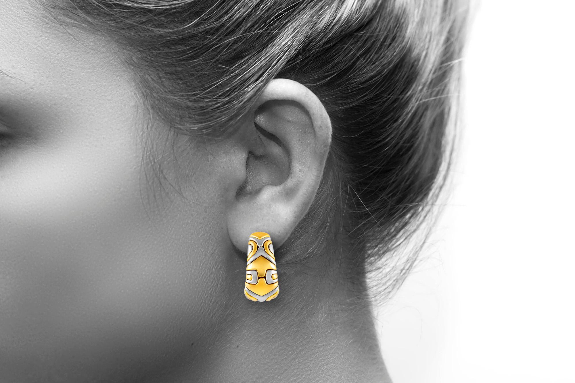 Bvlgari Parentesi earrings finely crafted in 18 k yellow gold and stainless steel. Large model