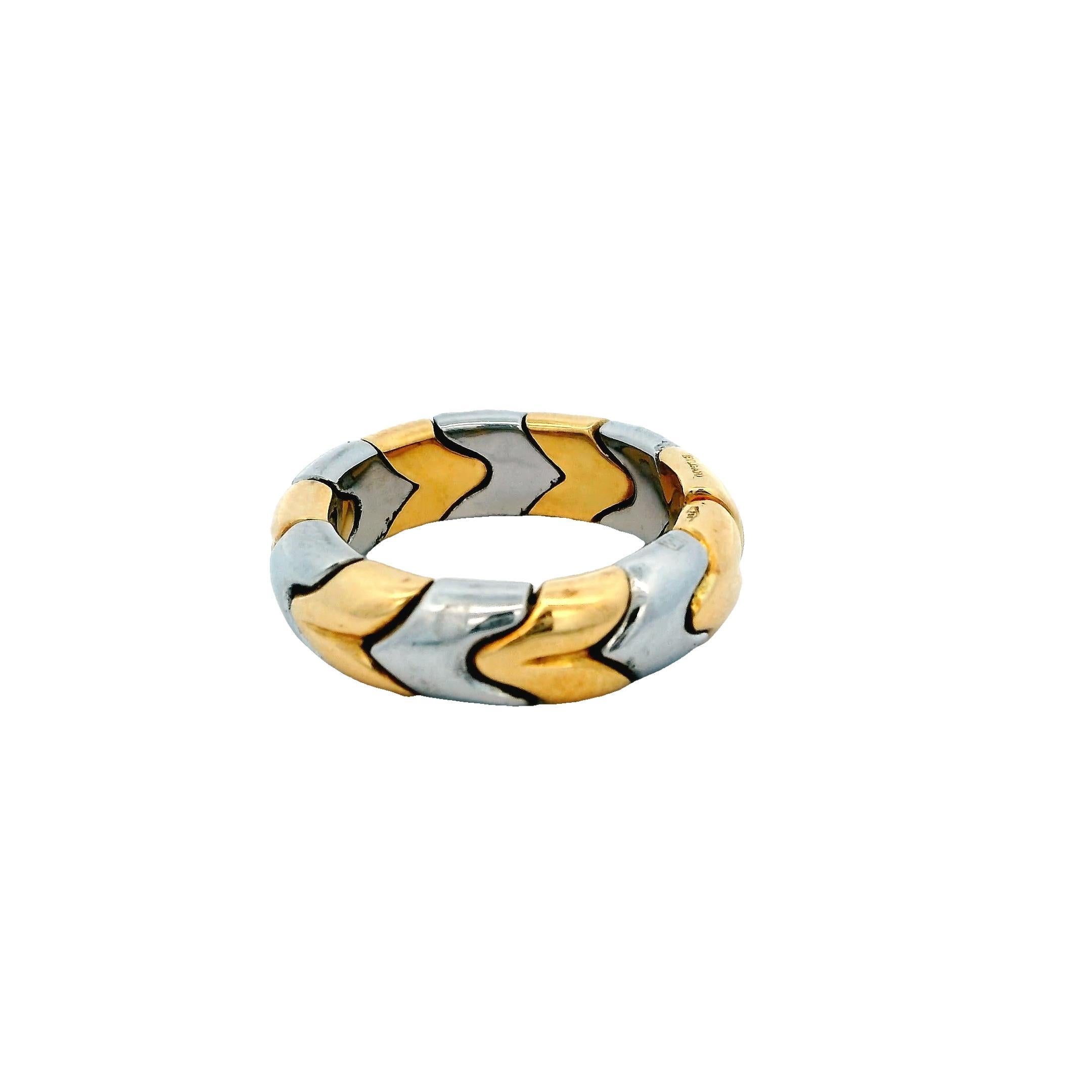 A striking Bvlgari ring, crafted in 18k Gold and Stainless Steel, featuring an interlocking design. 

Ring size 5.75

Total weight 8.0g