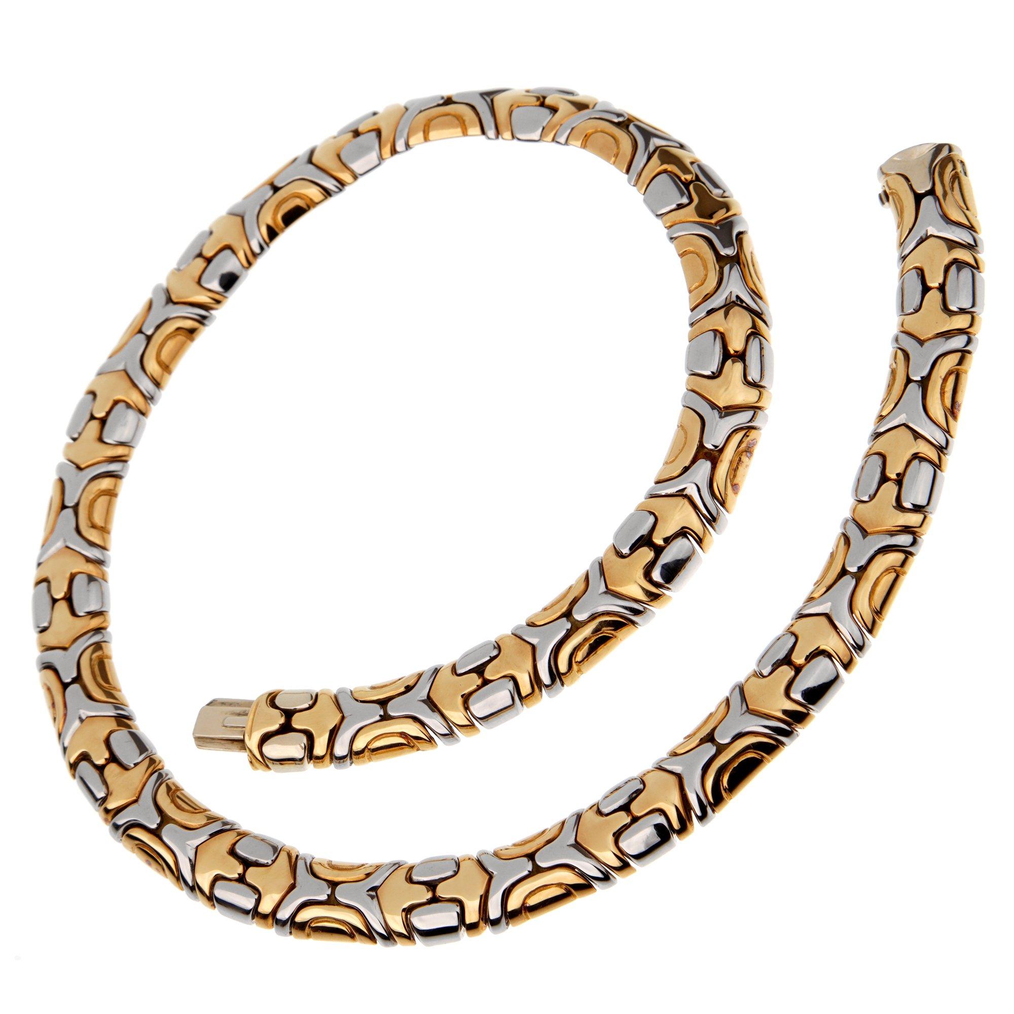 An iconic authentic Bvlgari choker necklace circa 1990's necklace in yellow gold and alternating white gold segments. The necklace measures 14” in length and has a total weight of 87 grams.