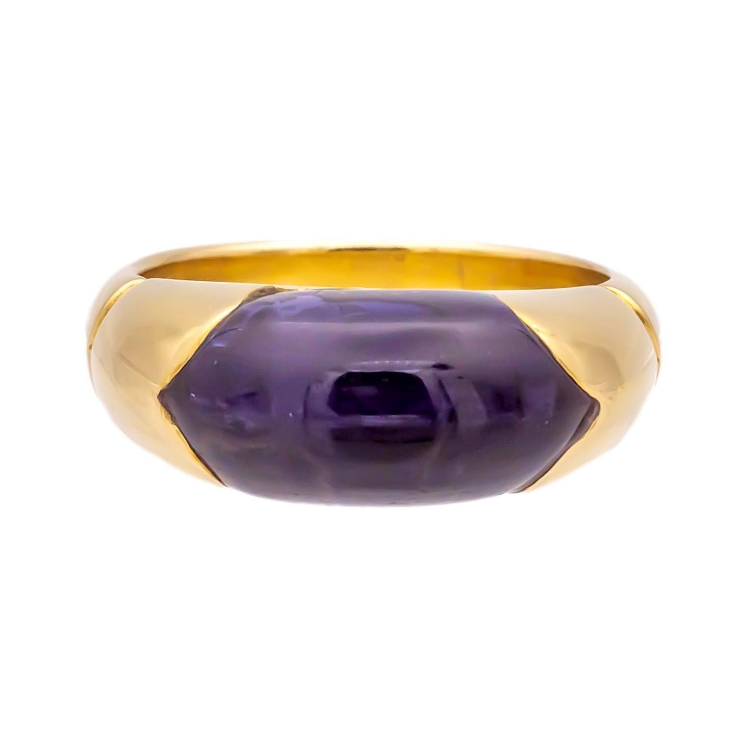 This Bulgari Tronchetto ring exemplifies the bold, vibrant designs that defined Bulgari’s innovation in the 1980s reflecting the shift toward bold and colorful jewelry. Part of the Tronchetto collection, the ring features a cabochon-cut amethyst
