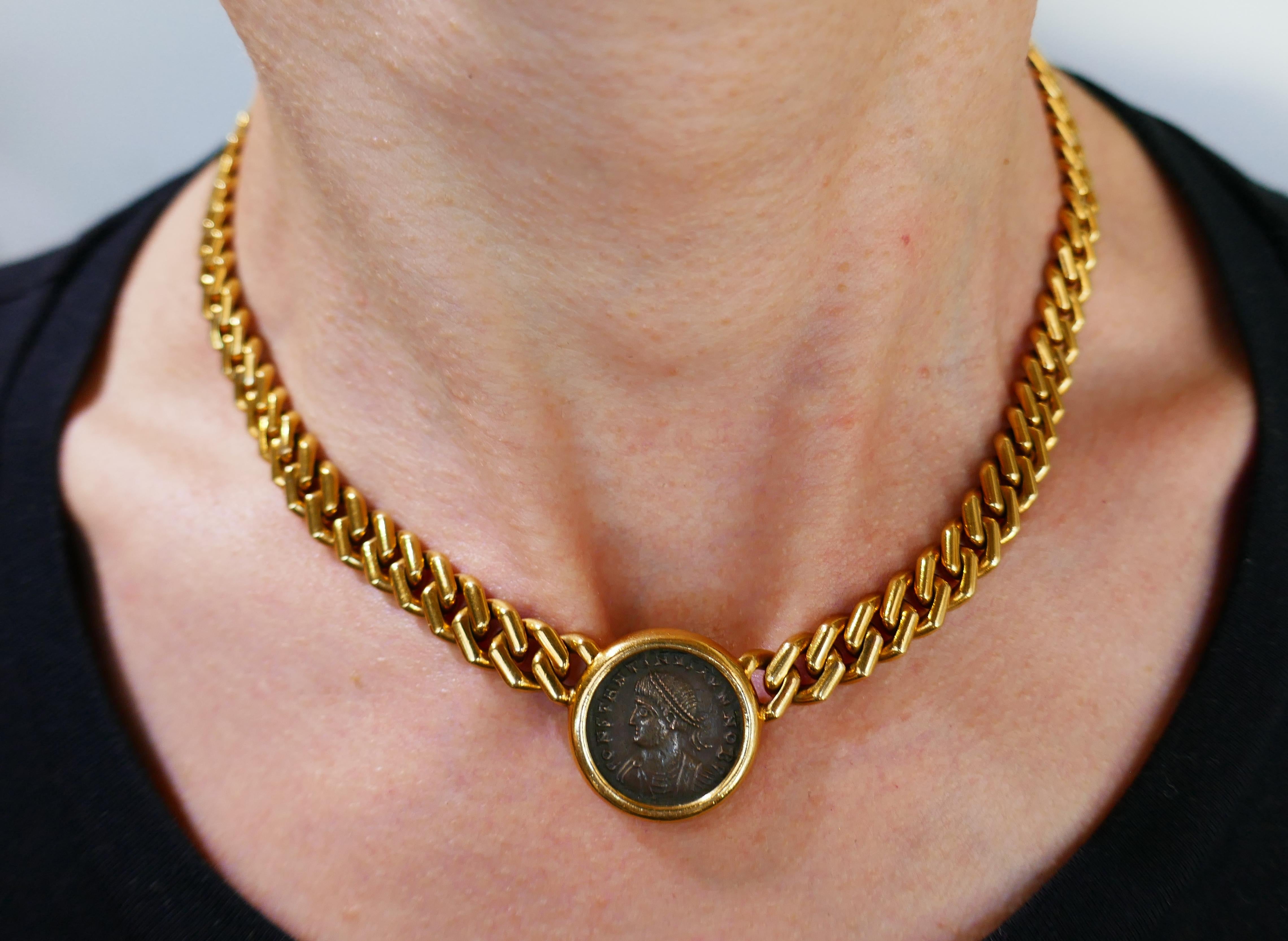 Signature Bulgari coin necklace from Monete Collection. Bold, elegant and wearable, the necklace is a great addition to your jewelry box.
The necklace is made of 18 karat yellow gold and features an ancient Roman bronze coin Constantino II dated