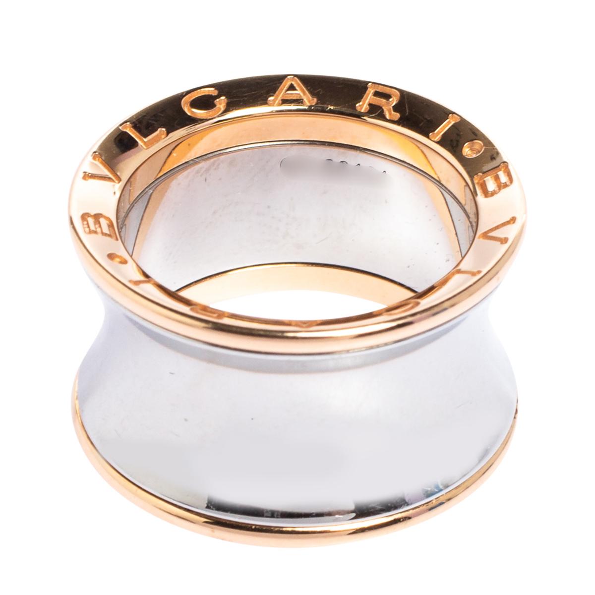 The iconic B.Zero1 ring is updated by Anish Kapoor, replacing the spirals with a defined, hourglass silhouette. The B.Zero1 ring is cast in stainless steel and the edges are secured by 18k rose gold set with signature engravings.

