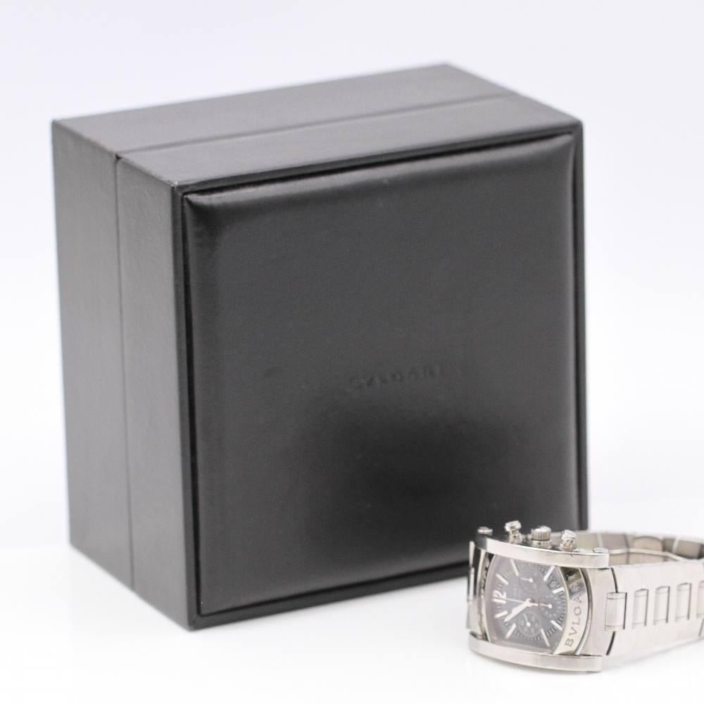 BVLGARI ASSIOMA AA44SCH Ref: E359073 Gentleman's watch in VERY GOOD condition, with steel case 34,5x44mm excluding crown (crown not original). Sapphire crystal. Blue dial (some dirt between 1 and 3 o'clock). Automatic movement. Date. Chronograph.