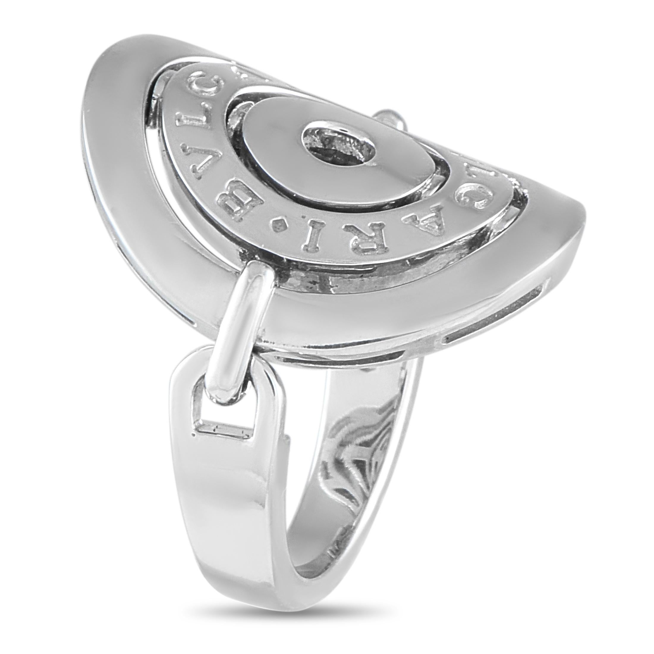 The elegant yet avant-garde Bvlgari Astrale ring is crafted in solid 18K white gold. It features a semi-articulated design, with a polished band supporting concentric circles that are reminiscent of celestial orbits. The ring has a 4mm-thick shank,