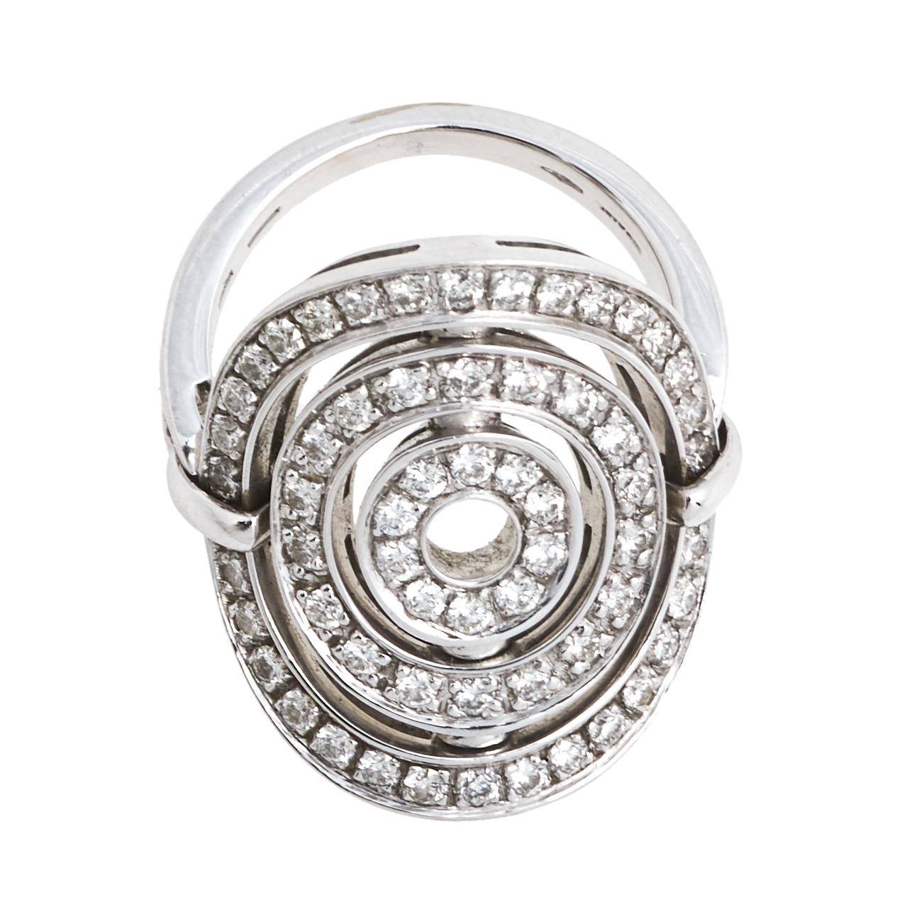 Well-crafted jewelry like this one is hard to come by. This Bvlgari ring speaks beauty with its details. Crafted from 18k white gold, the ring has smooth curves and a minimal charm. It has a detail of three circles as the head, all of which are