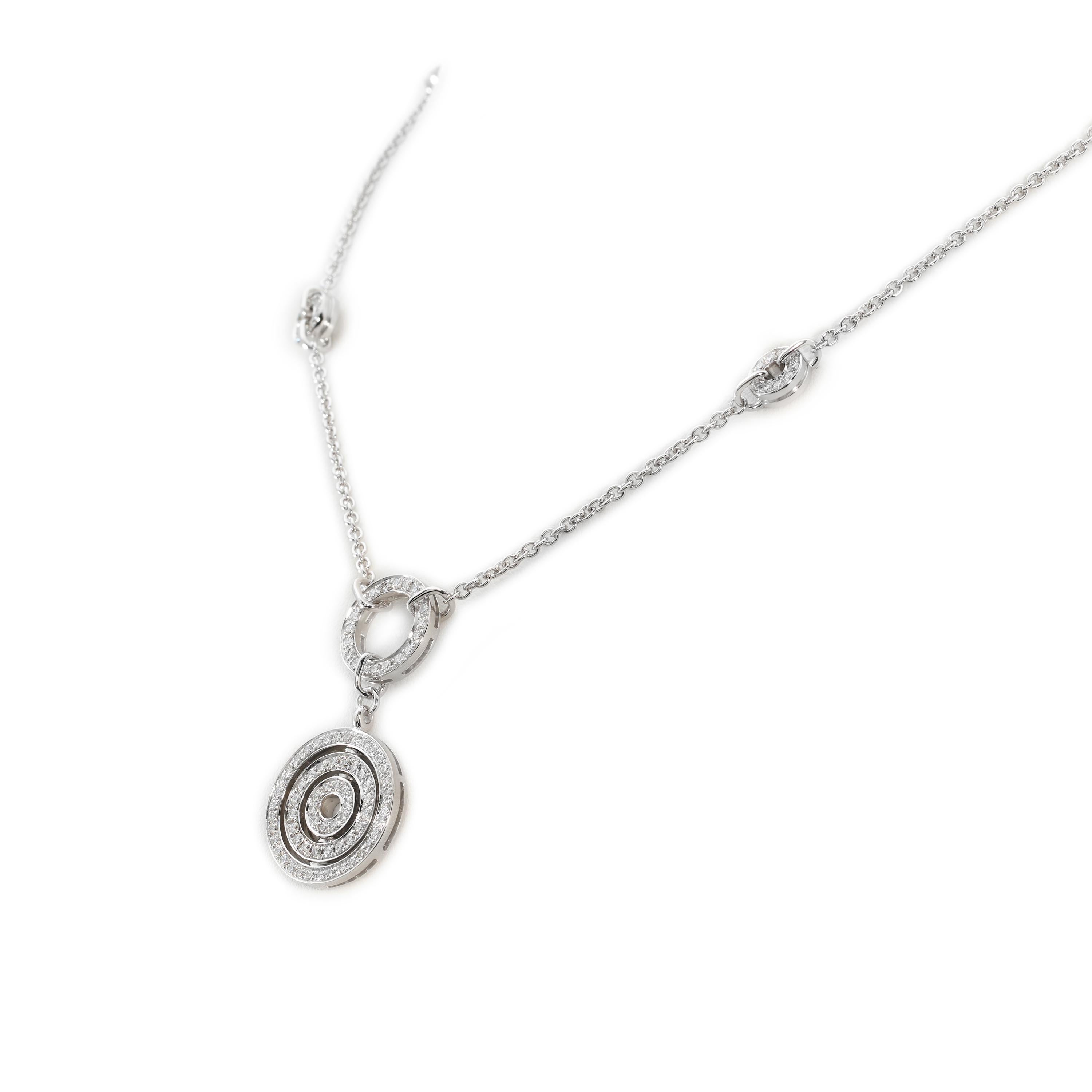 Authentic Bvlgari Astrale Cerchi Pendant necklace crafted in 18 karat white gold and set with glittering round brilliant cut diamonds.  The pendant is situated on an 18-inch adjustable chain, accented by four round diamond-set stations for an