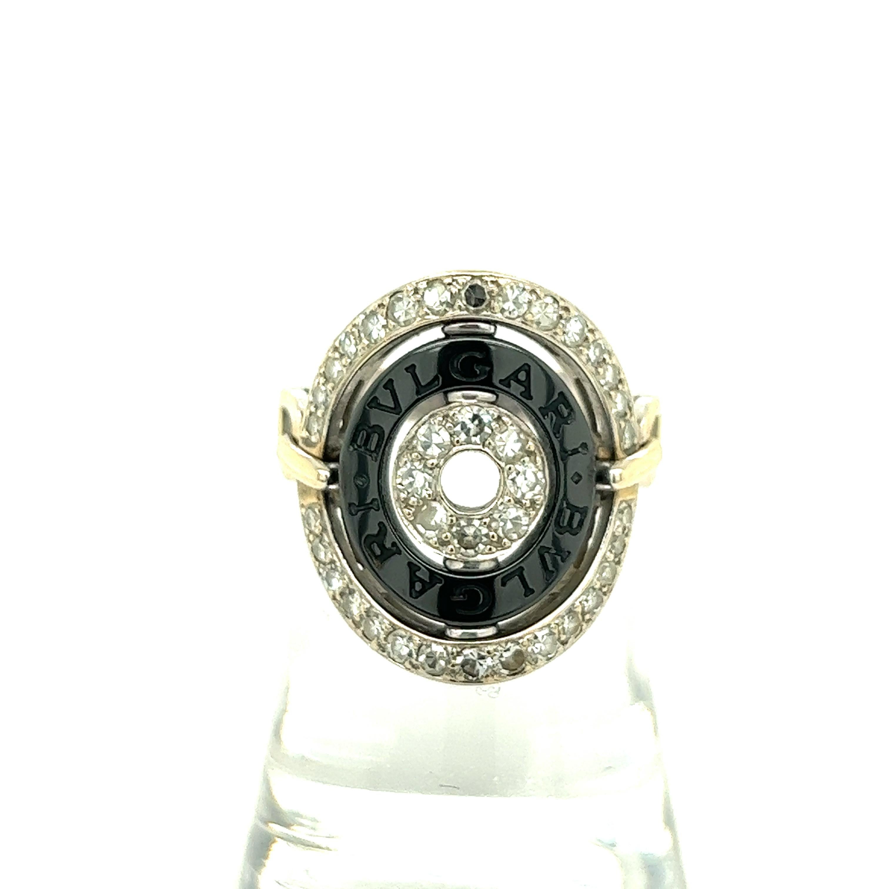 Bvlgari Astrale Movable 18k White Gold Diamond Ring

Thirty eight round brilliant-cut diamonds of approximately 1 carat total, set on 18 karat white gold, accented by a middle ring of blackened ceramic; marked Bvlgari, Bvlgari, 750, Made in