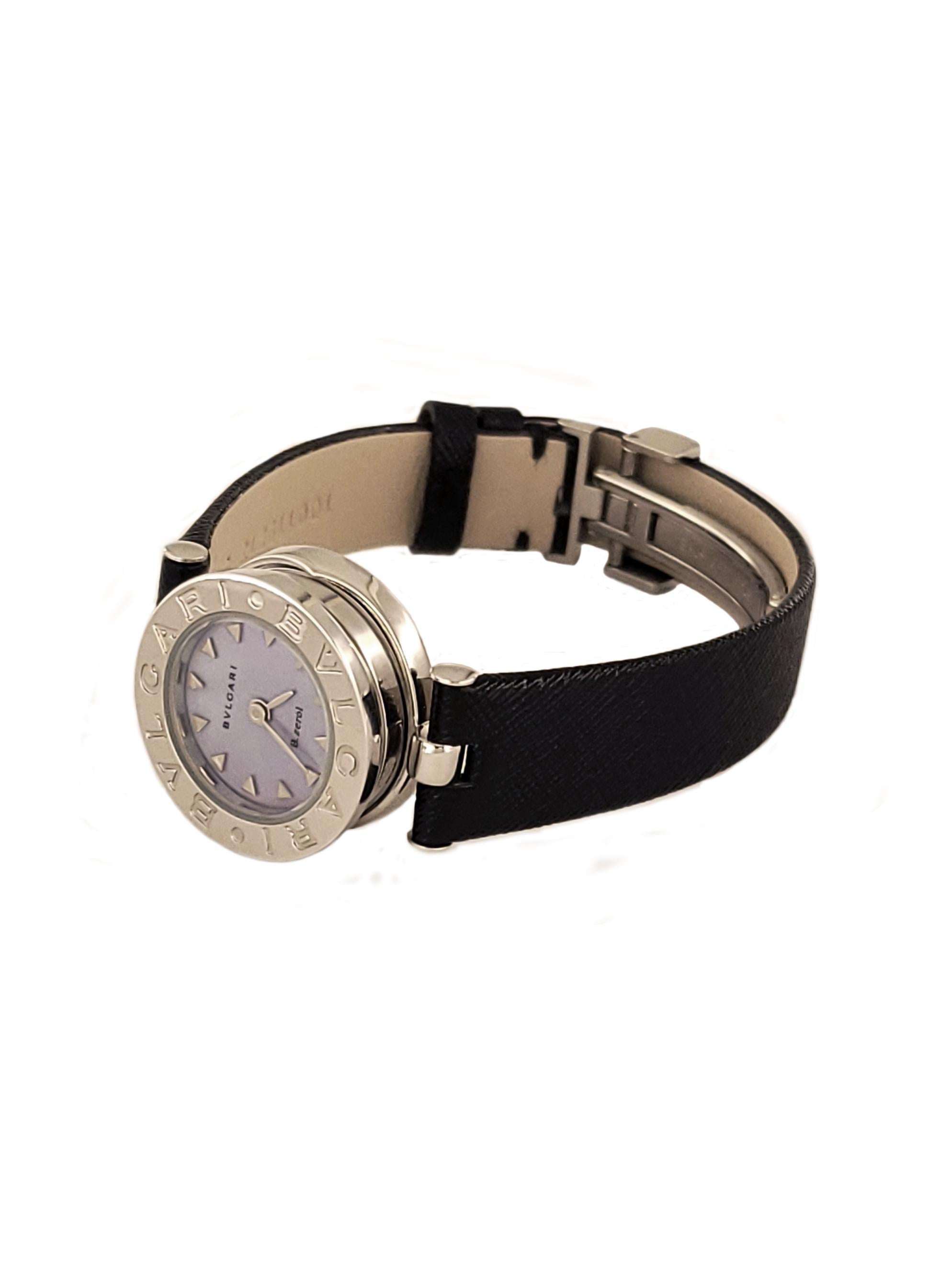 Bvlgari B Zero 1 BZ22S Watch.

Brand: Bvlgari
Style: B Zero 1
Model: BZ22S
Strap: Black Leather
Movement: Quartz
Dial: Purple
Case Material: Stainless Steel 
Case Size: 22mm
Case Thickness: 9mm
Lug Width: 13.5mm

*Includes Bvlgari Box.